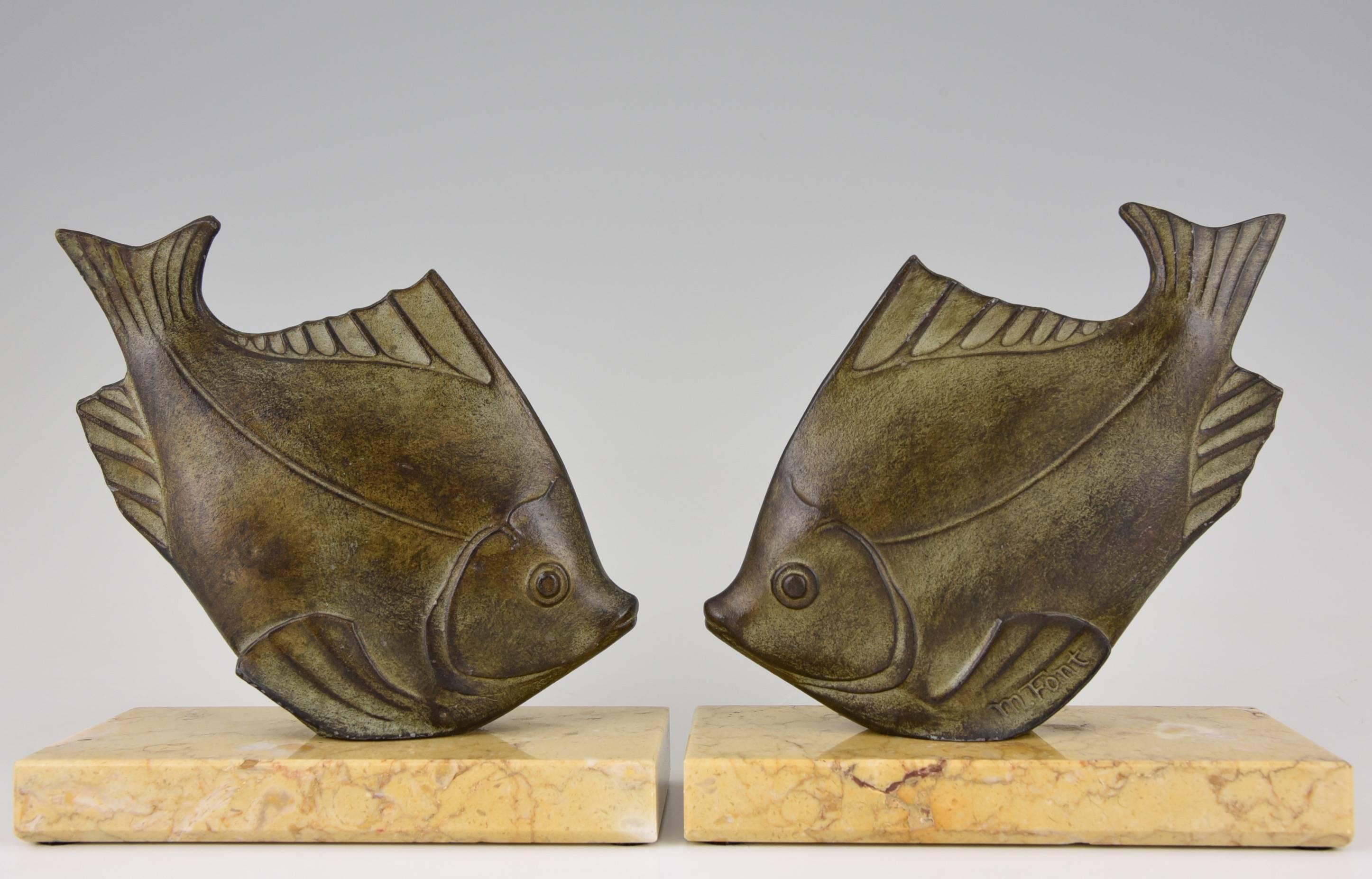 Description:  Art Deco fish bookends
Artist / Maker: M. Font. 
Signature / Marks: M. Font
Style:  Art Deco.		
Date:  1930.
Material:  Green patinated metal.  Marble bases.
Origin:  France.			
Size of one:		 
H. 6.1 inch x L. 5.9 inch x W.
