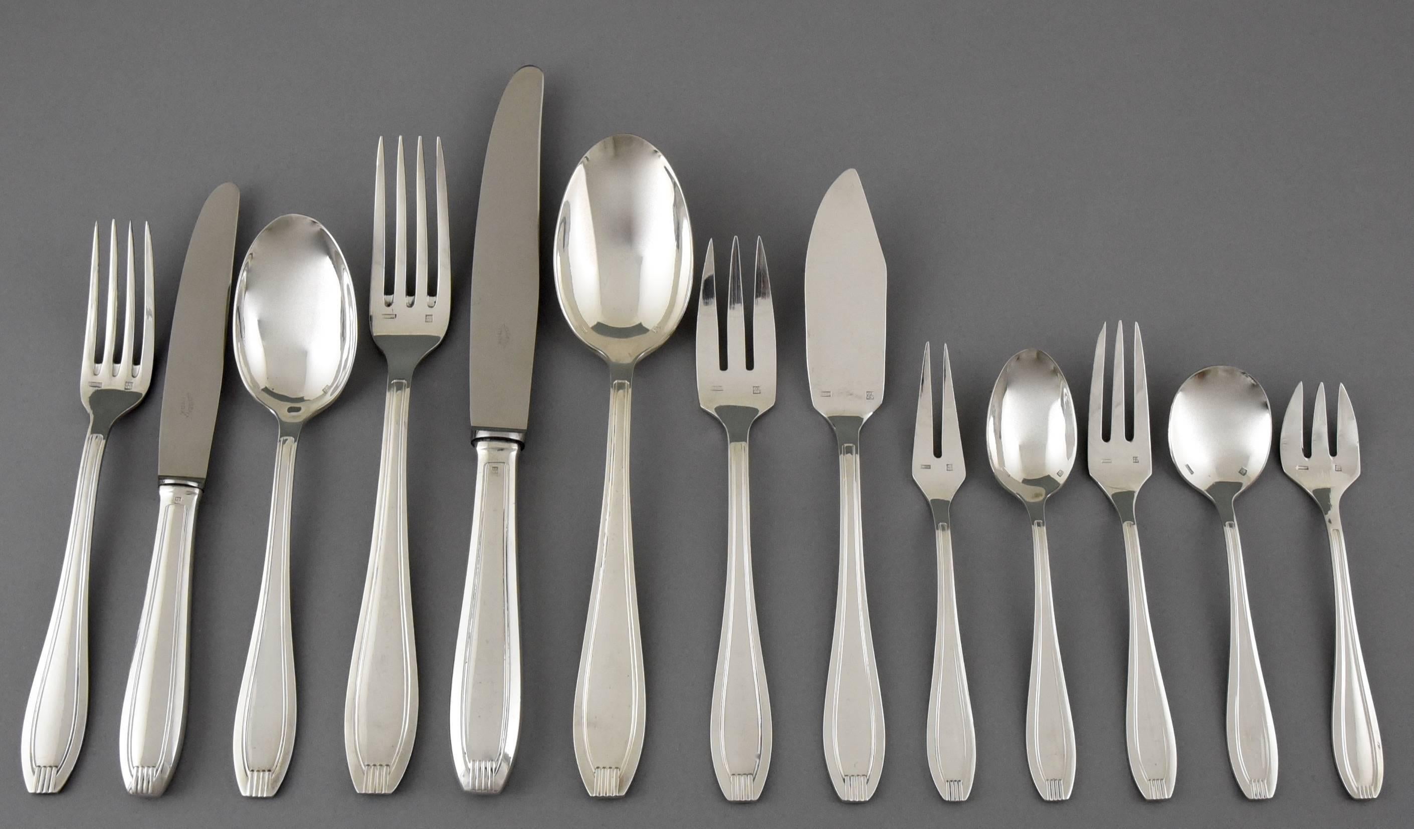 Description: 
A complete set of Art Deco silverware cutlery for 12 persons.
178 pieces. 13 x 12 = 156  plus 22 serving utensils .
The set is contained in a 5 decks wooden box with original handles and key. 
Maker:  François Frionnet, 