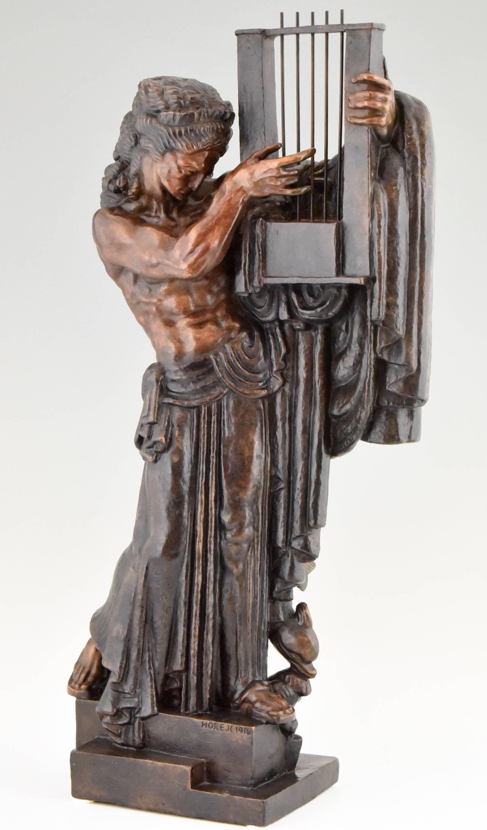 Description:  Bronze sculpture of Orpheus with lyre. 
Artist/ Maker:  Jaroslav Horejc 1886-1983. 
Signature / Marks: Horejc, 1916.
Style:  Art Deco. 
Date:  Model created in 1916, cast circa 1960. 
Material: Patinated bronze. 
Origin: