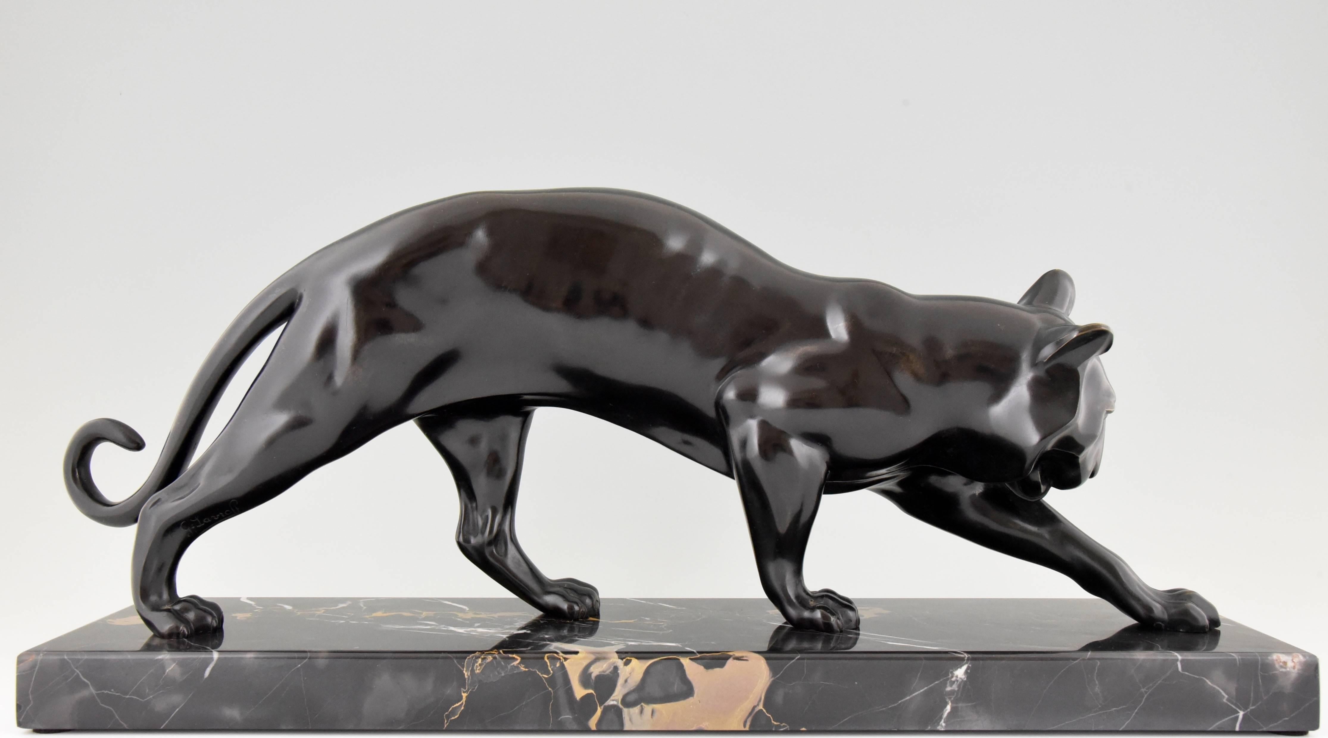 Description:
Art Deco bronze sculpture of a panther. 

Artist/ maker: 
Georges Lavroff.
Born in Russia in 1895, lived and worked in France. 

Signature & Marks:
G. Lavroff.
Bronze, Paris. 

Style: 
Art Deco.

Condition: 
Excellent