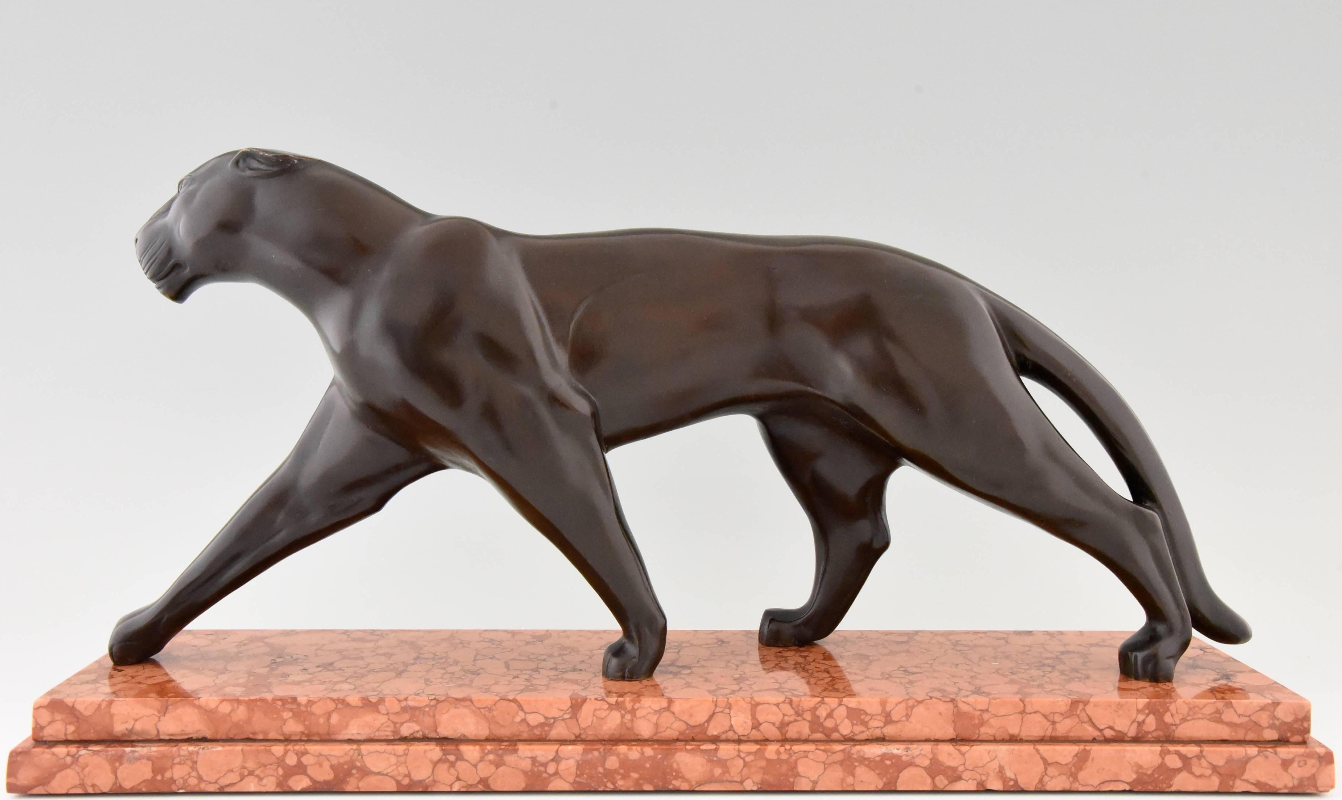 Description:  Art Deco bronze panther. 
Artist/ maker:  Michel Decoux,  France, 1837-1924.
Signature/ marks: Decoux. Bronze.
Style:  Art Deco.
Date:  1925/1930.
Material: Bronze, patinated.  Marble base.
Origin:  France.
Size:
 H.10.8 inch x