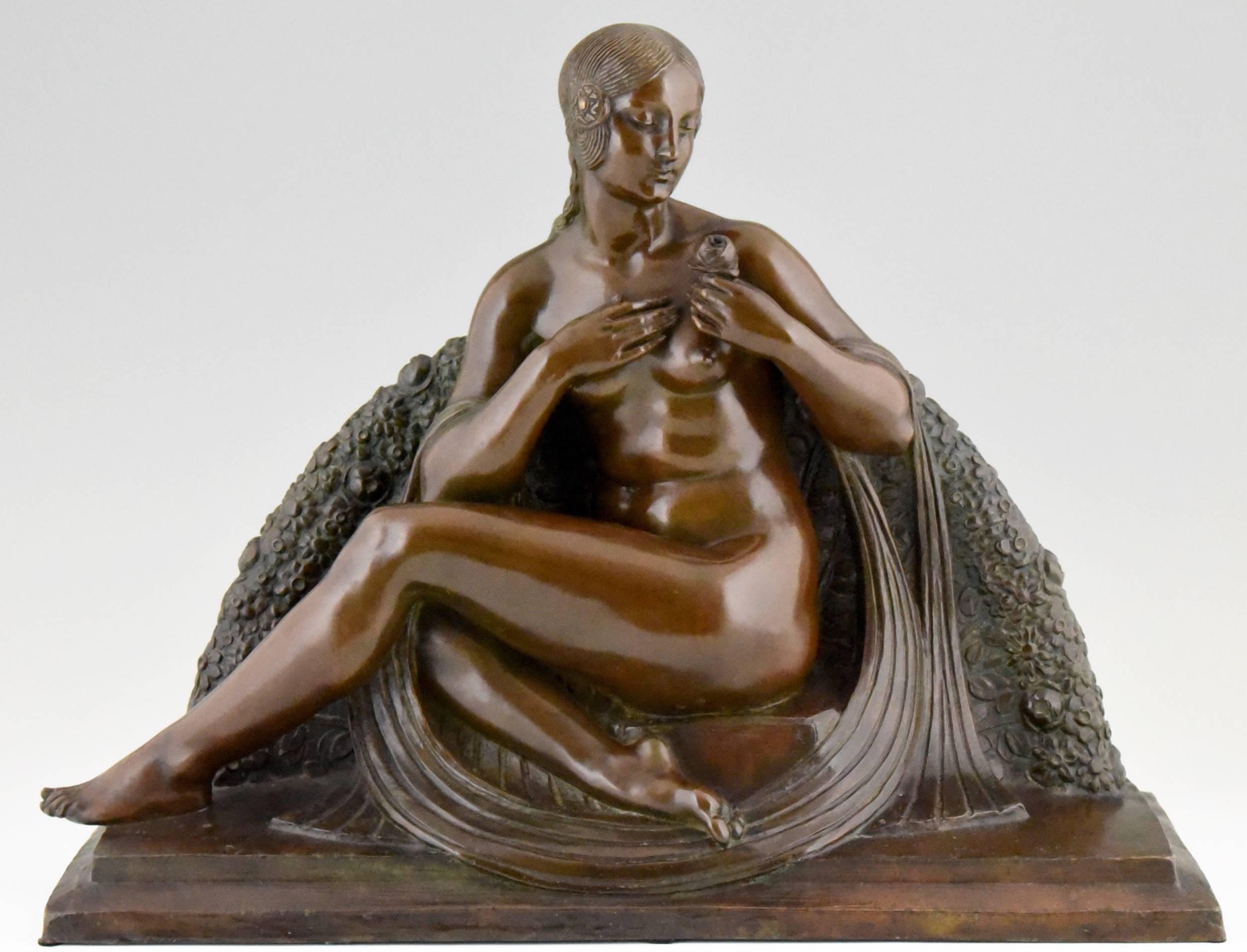 Title:  “Scent of the rose.”
Description: Art Deco bronze sculpture of a nude holding a roze.
Artist/ Maker:  Joe Descomps (1869-1950).
Signature/ Marks:  Joe Descomps.  Etling foundry seal.  Number. 
Style:  Art Deco.
Condition:  Excellent