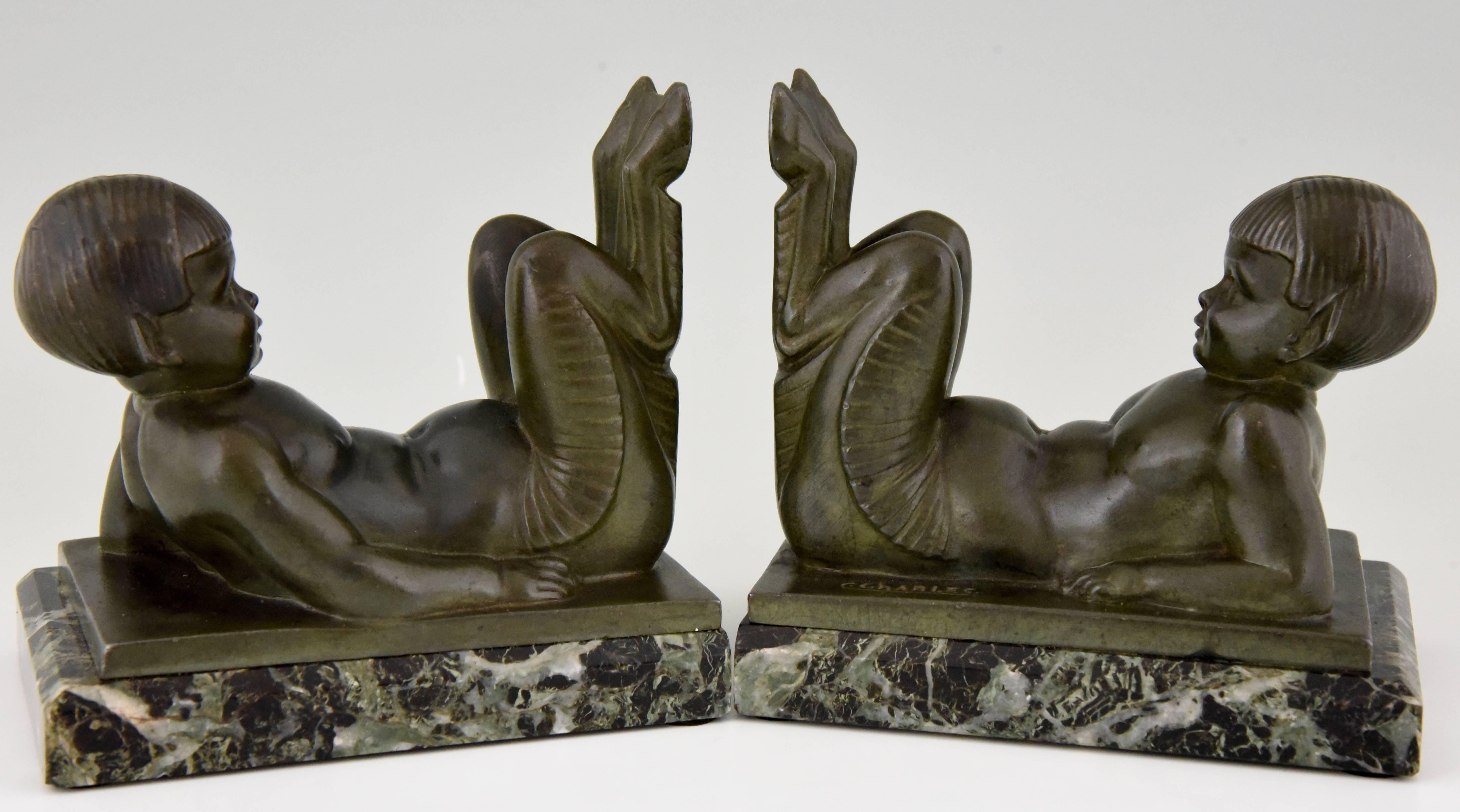 Patinated French Art Deco Bookends Young Satyrs by C. Charles on Marble Base, 1930