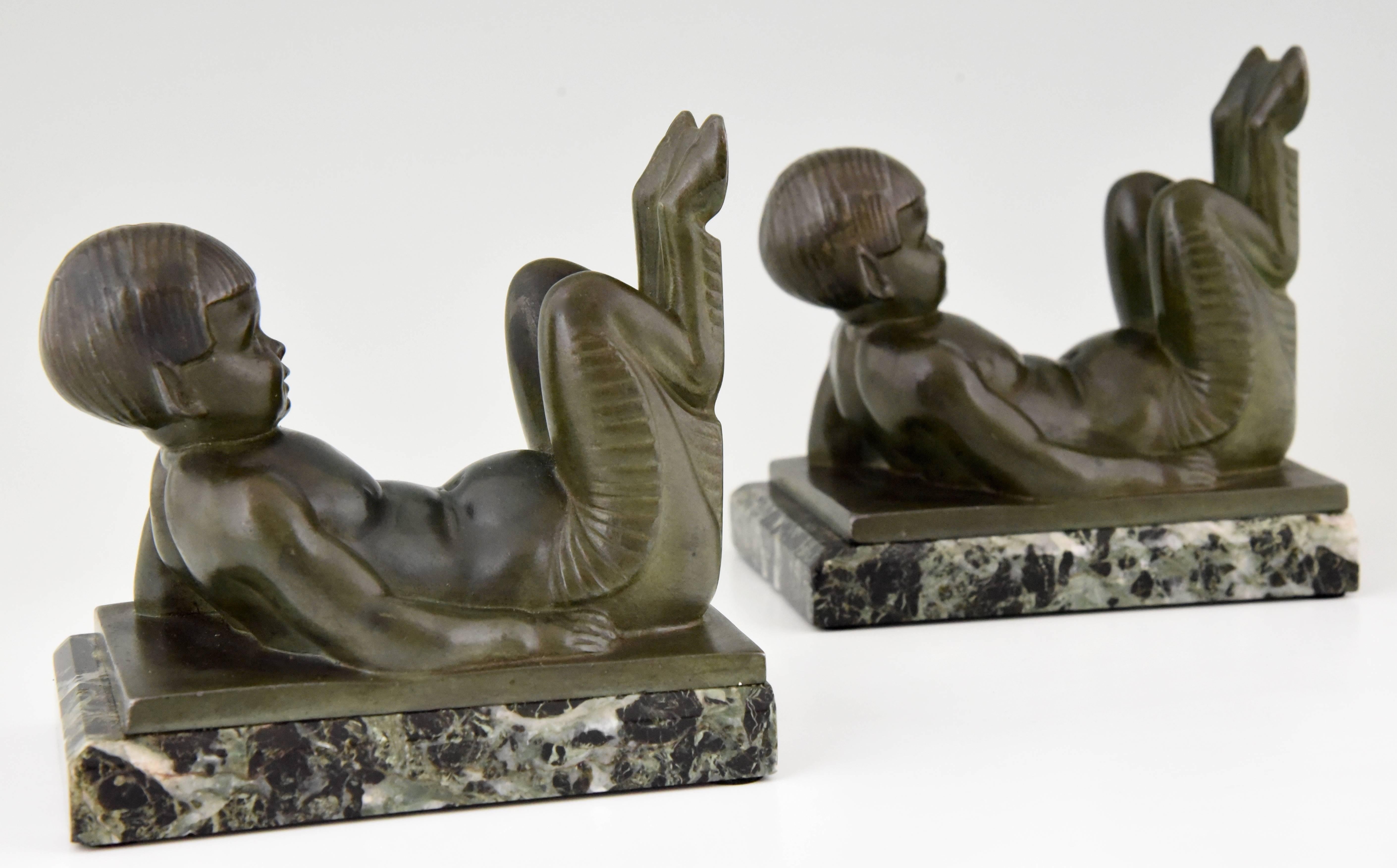 Metal French Art Deco Bookends Young Satyrs by C. Charles on Marble Base, 1930