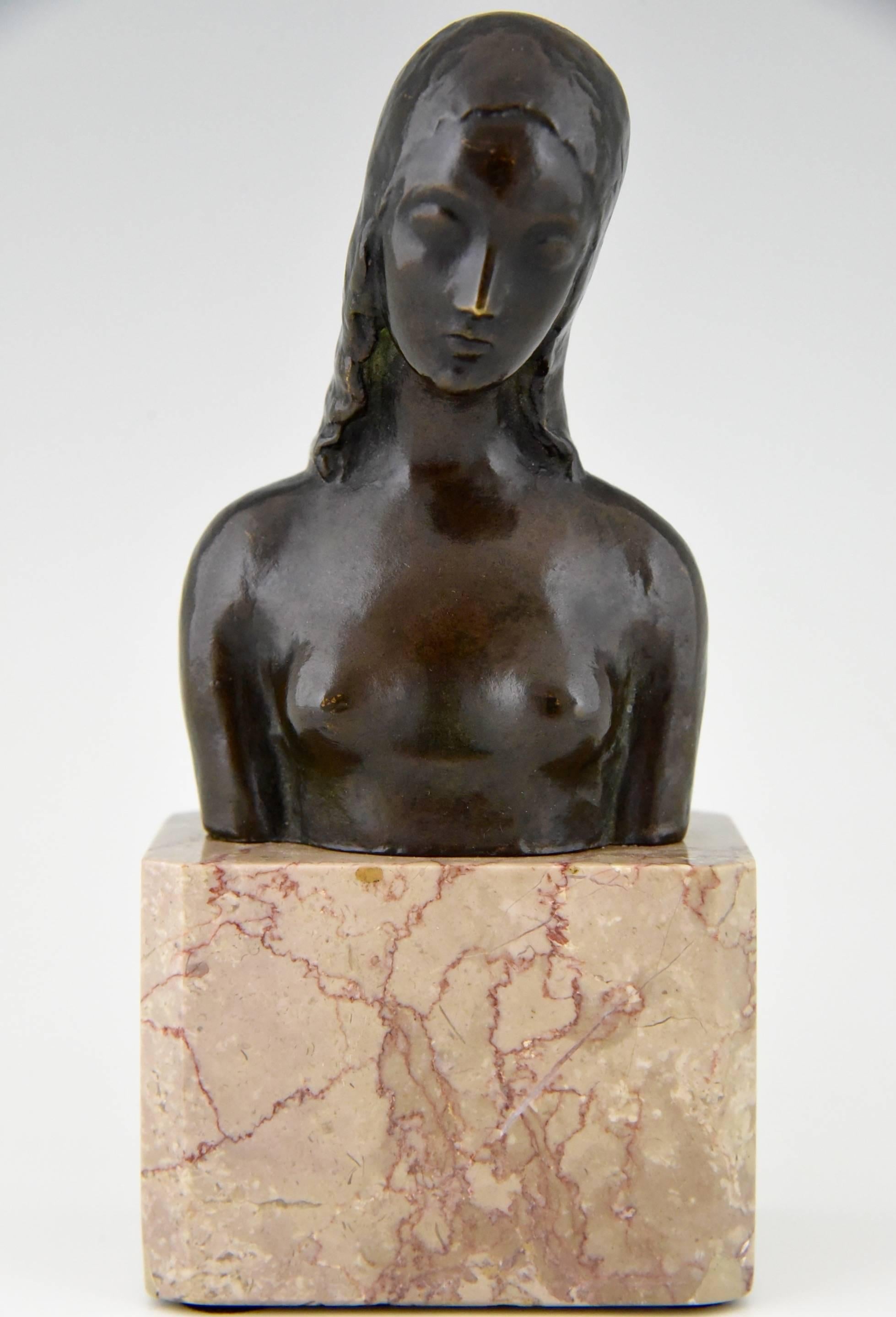 Description:  Art Deco bronze bust of a female nude. 
Artist / Maker: Moselsio, Simon (1890-1964)
Signature / Marks: Moselsio. 
Style:  Art Deco.		
Date:  1930.			
Material: 	 Bronze, very dark brown, almost black patina.  Marble