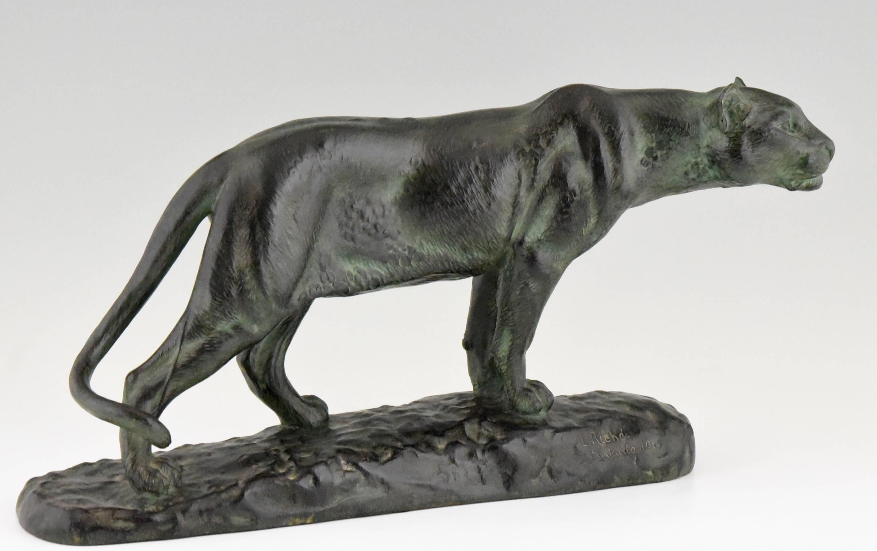 Patinated French Art Deco bronze sculpture of a panther by Louis Riché 1930