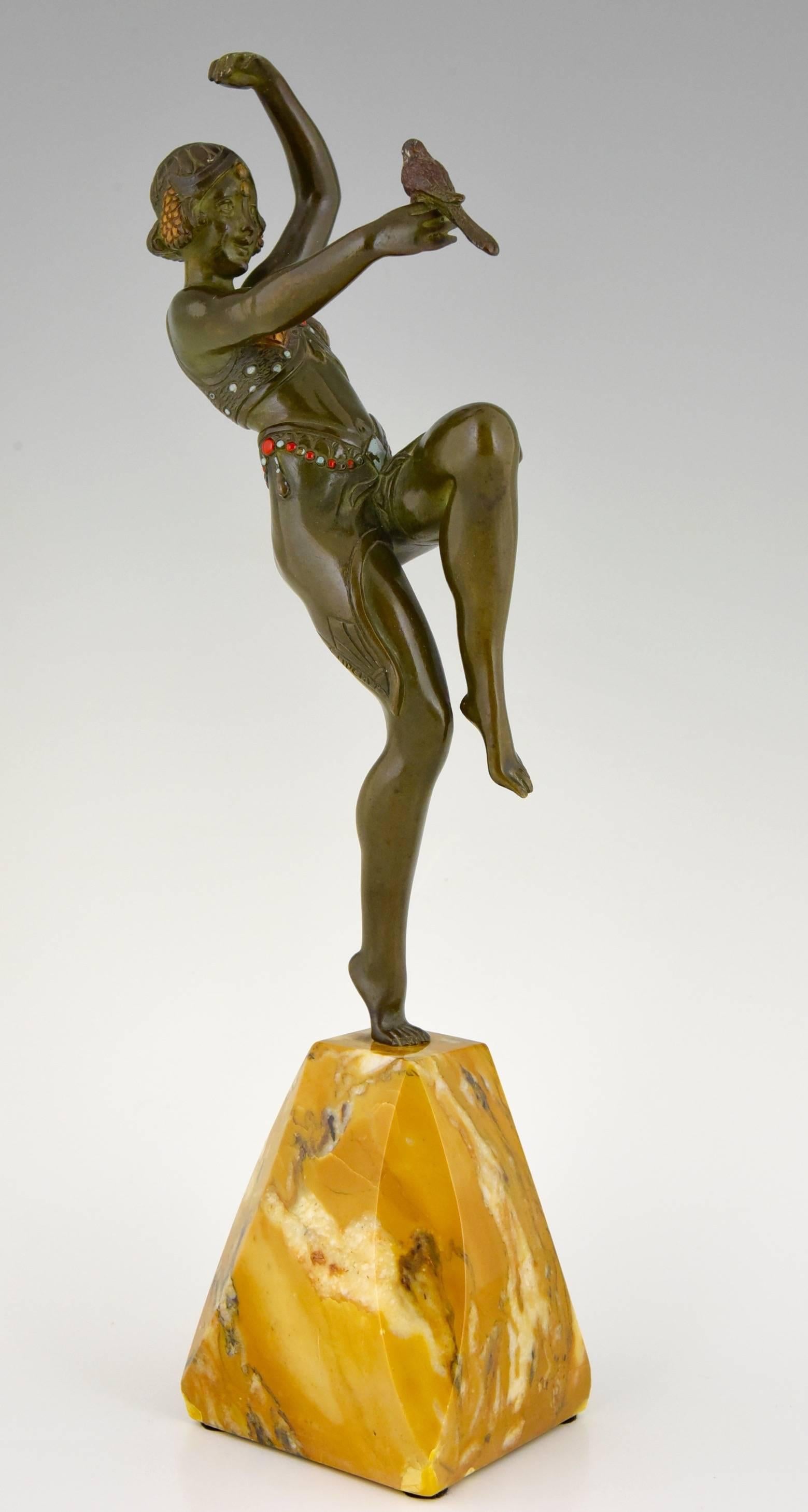 Art Deco bronze sculpture of a dancing girl holding a bird.
Green patinated bronze with enameled ornaments. 
Signed by the artist Samuel Lipchytz, (1880-1943)

Literature:
Art deco sculpture by Victor Arwas, Academy. 
Bronzes, sculptors and