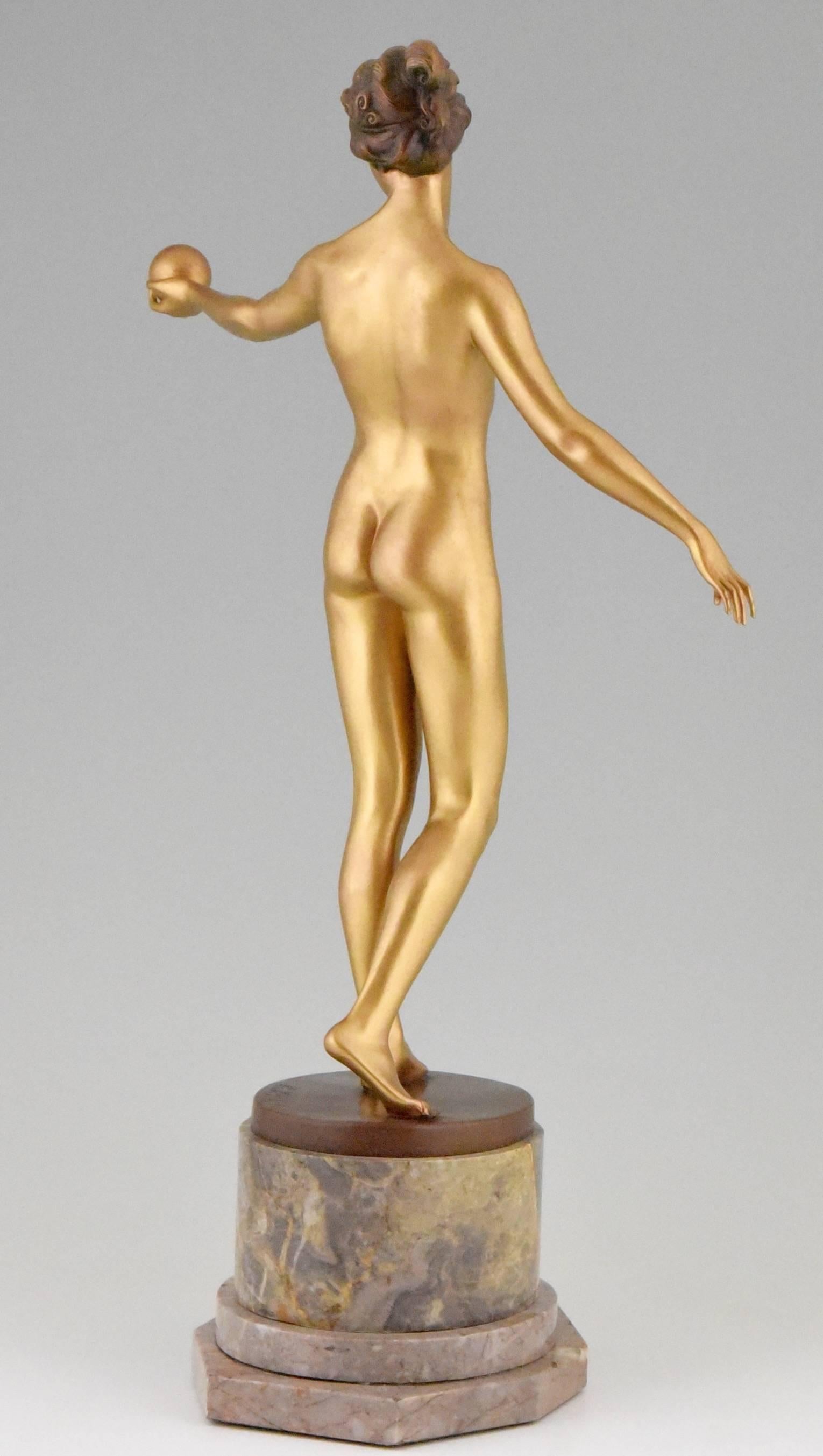 Art Nouveau bronze sculpture of a nude holding a ball by Hans Keck 1900 1
