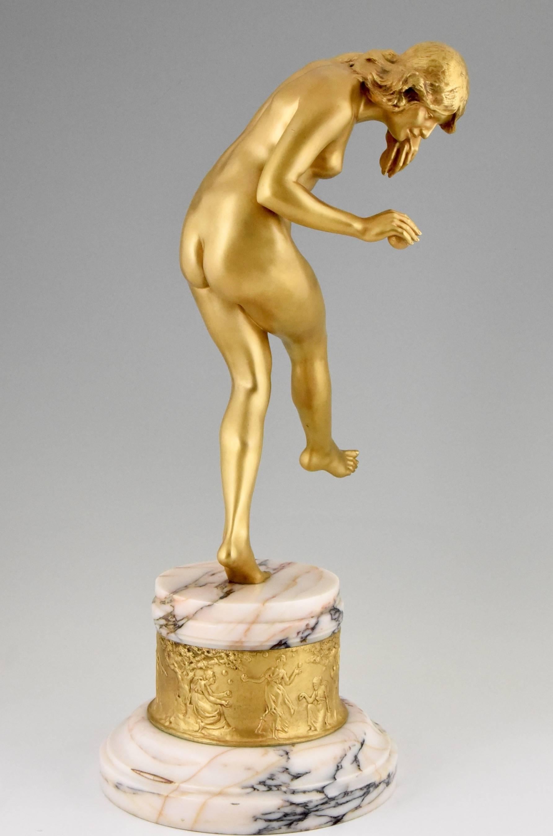 “Dance of the apple”
An Art Deco gilt bronze nude on a marble and bronze base.
The base has a gilt bronze relief decoration of nymphs dancing between trees signed by the French artist Louis Marie Jules Delapchier,

A picture of this bronze can