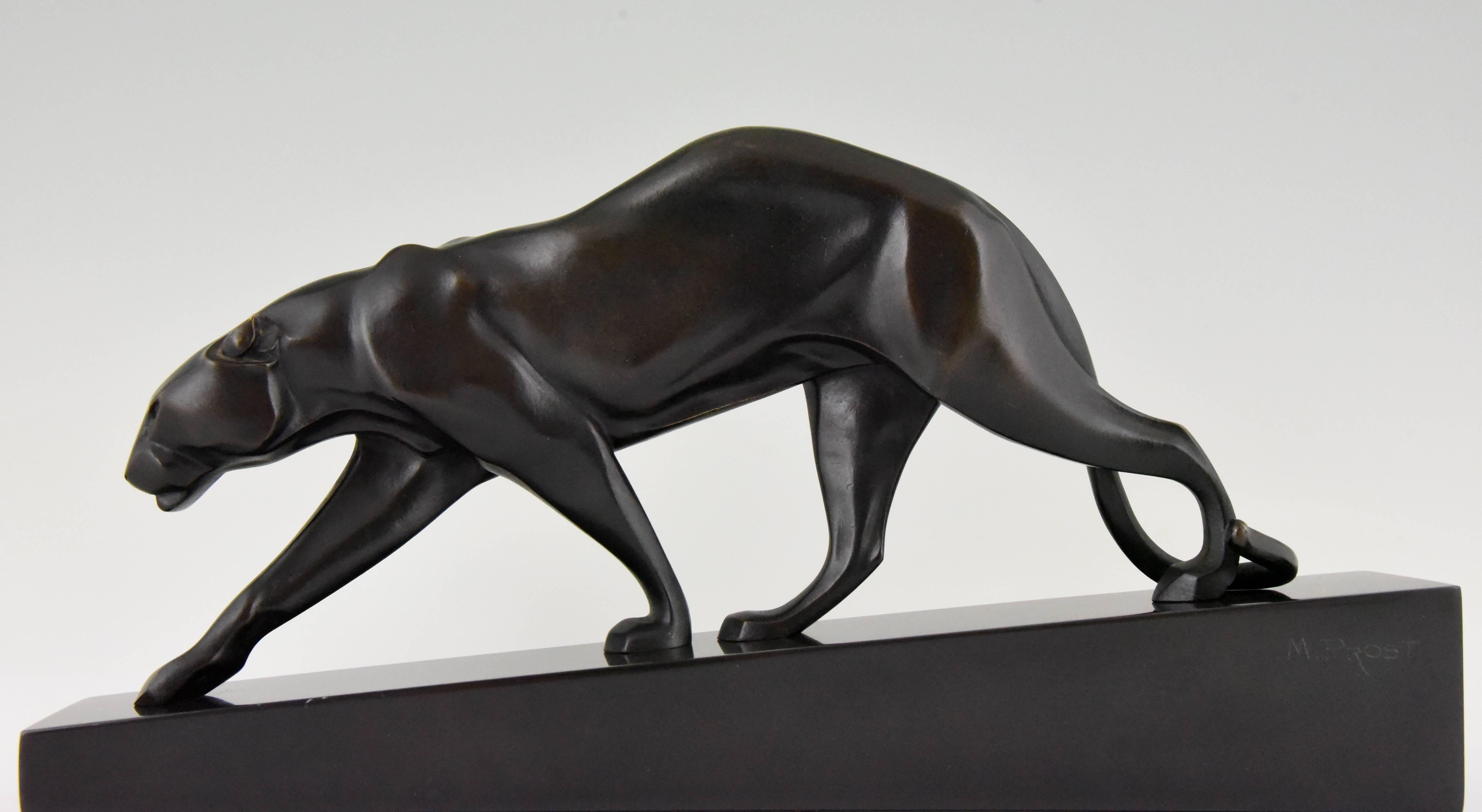 Beautiful bronze Art Deco sculpture of a walking panther on a Belgian black marble base. Signed by Maurice Prost with Susse Freres founders' signature. 

Artist/ Maker: Maurice Prost.
Signature/ Marks: M. Prost. ?Susse Frères éditeurs