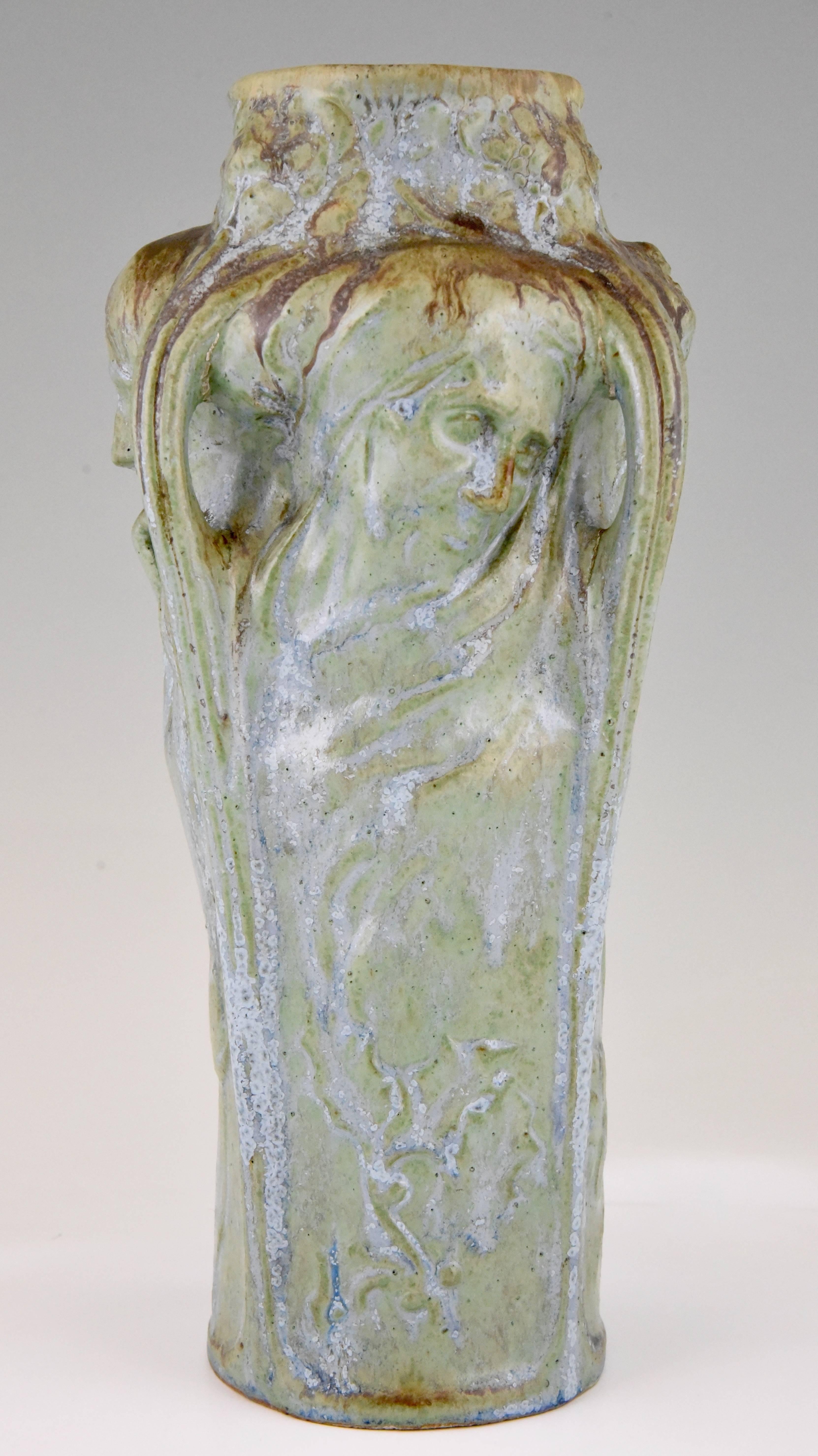 Art Nouveau glazed stoneware vase with four women's profiles and floral decorations representing the “Four Seasons”
By Alphonse Gentil et François Bourdet.
Designed by Firmin-Marcelet Michelet (1875-1951)
Another example of this vase is in the