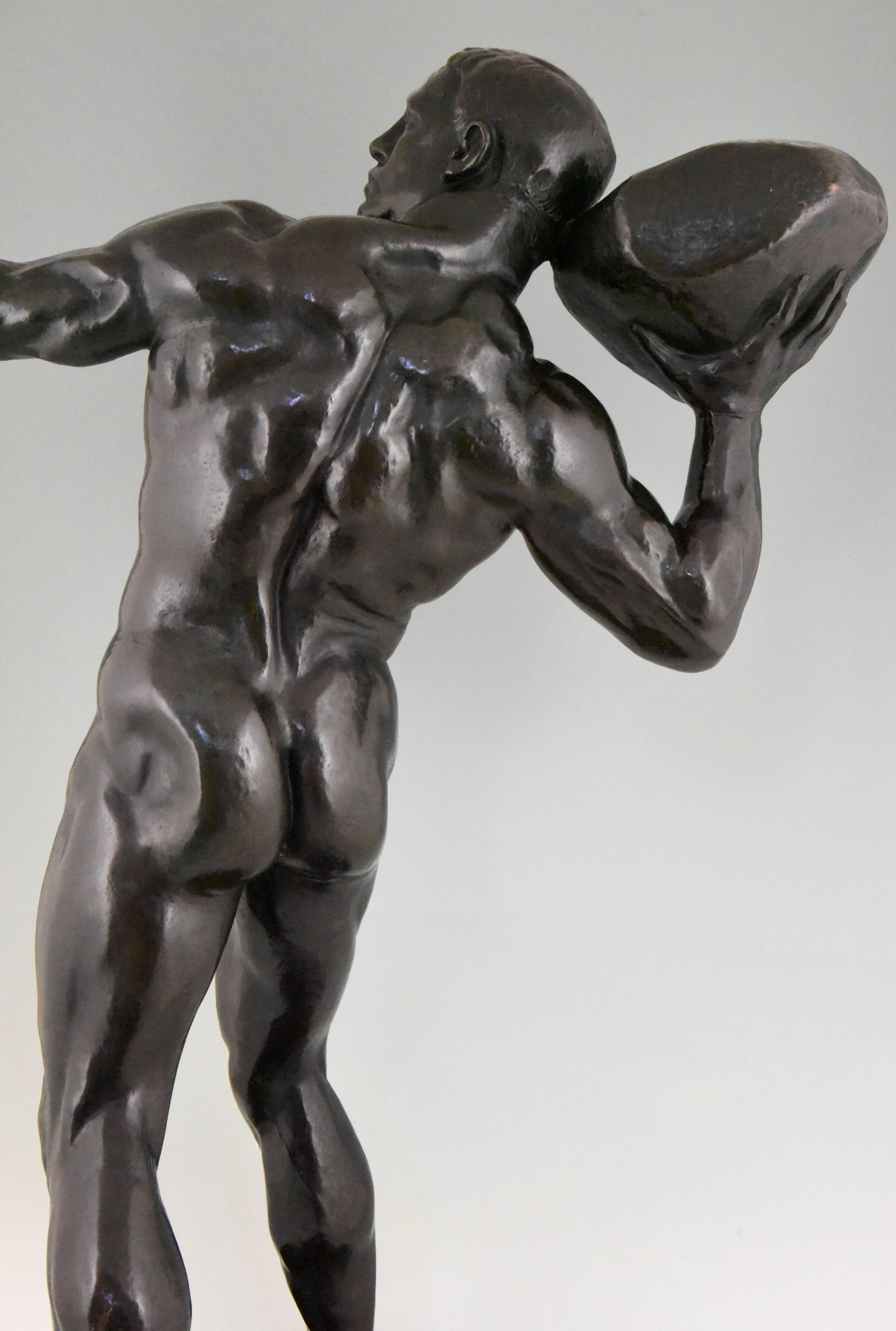 Patinated Antique Bronze Sculpture Male Nude with Stone Hugo Siegwart H. 36 inch For Sale