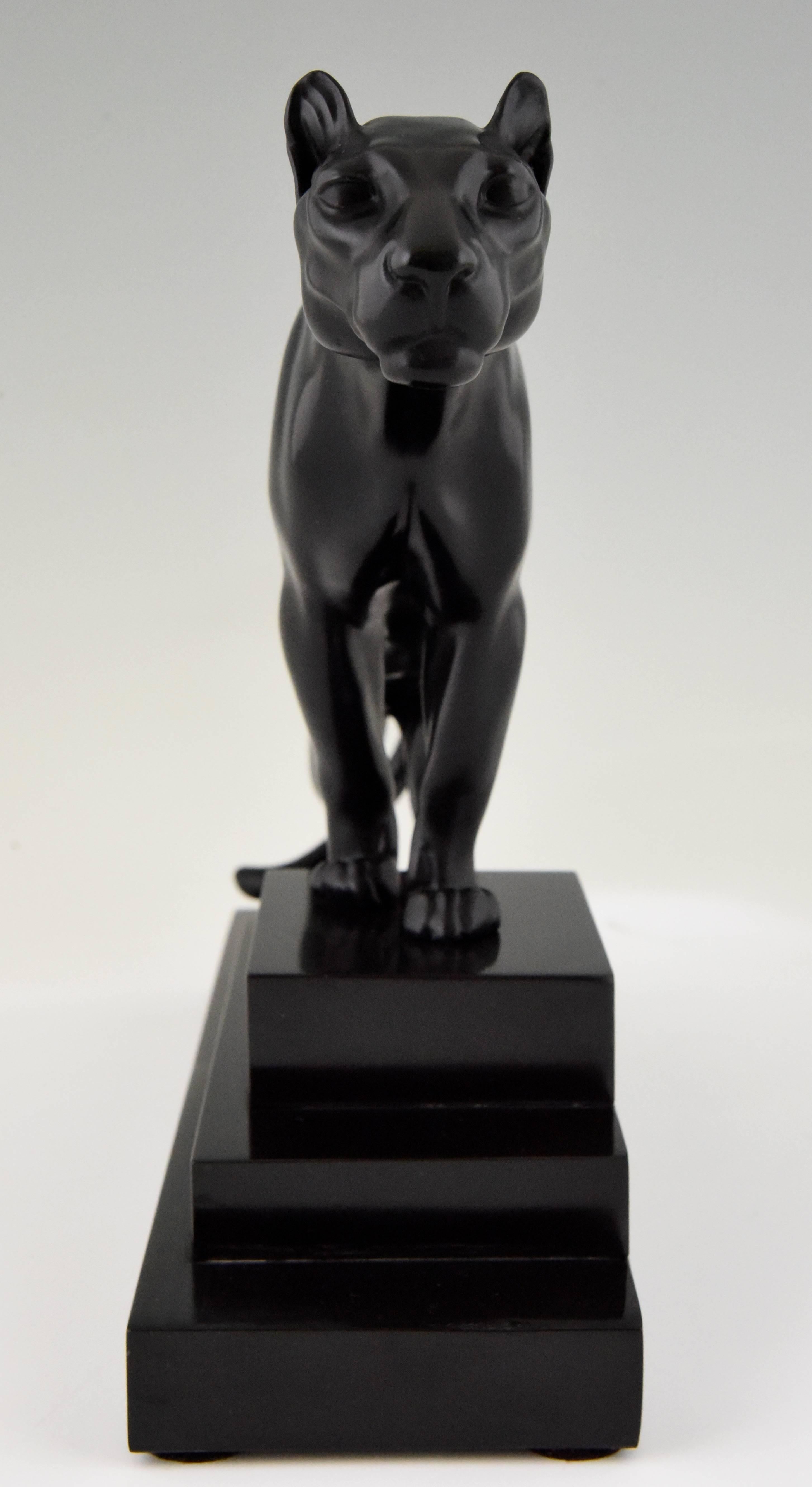Patinated Art Deco Sculpture of a Panther on a Stepped Marble Base Max Le Verrier, 1930