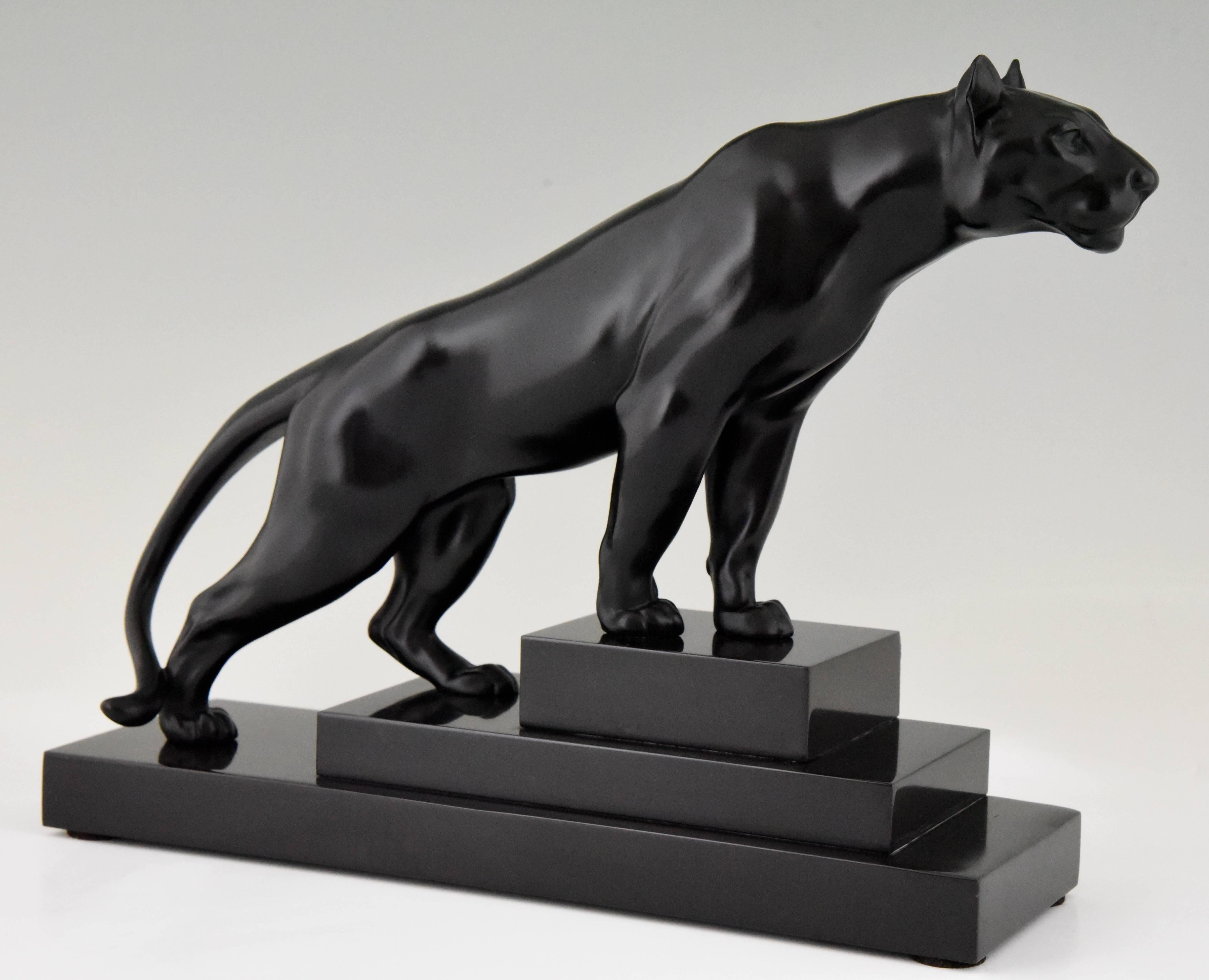 Hard to find Art Deco panther by the French artist Max Le Verrier on a stepped Belgian black marble base.
Artist/ Maker: Max Le Verrier
Signature/ Marks: M. Le Verrier
Style: Art Deco
Date: 1930
Material: Art metal with black patina. Belgian