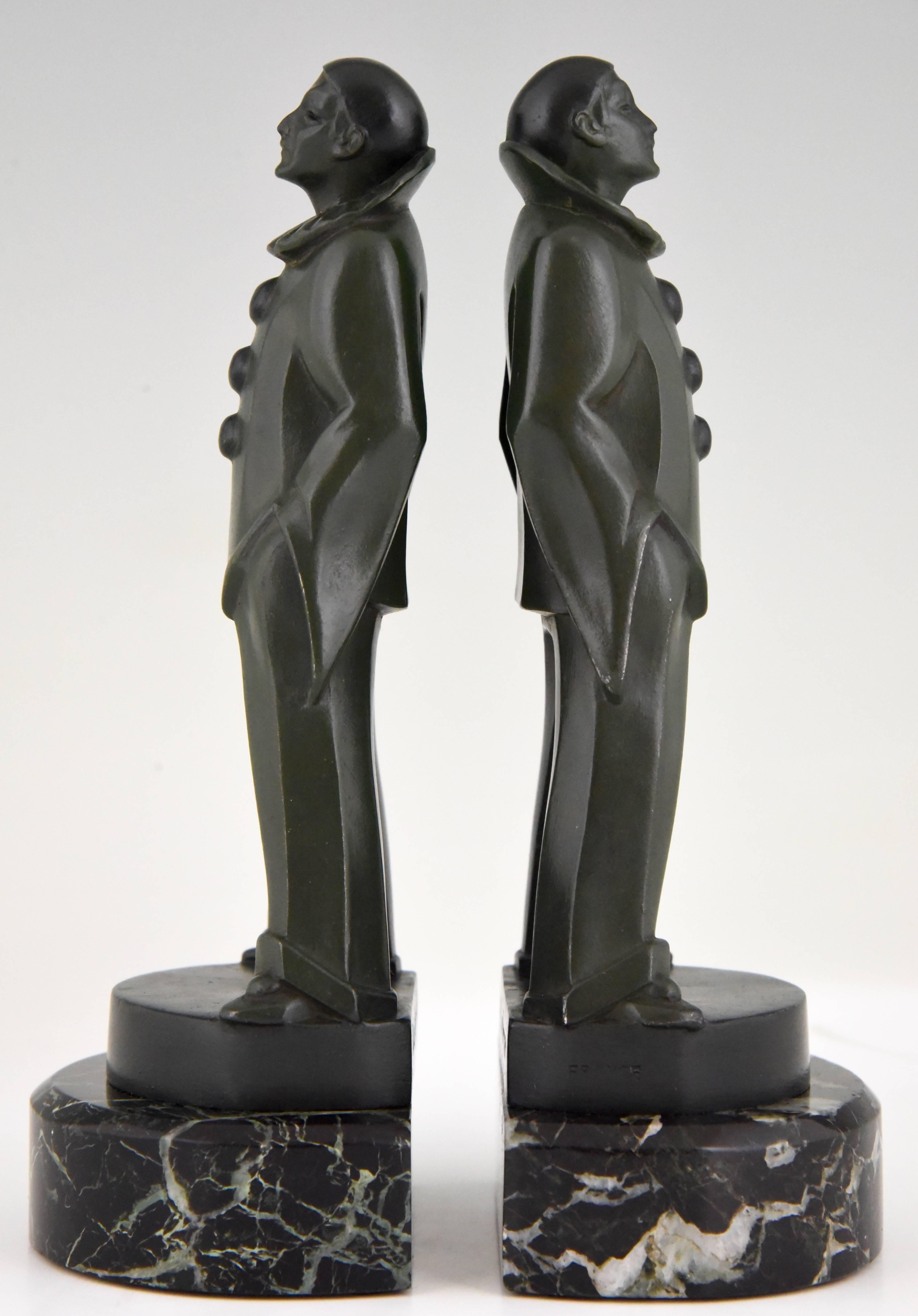 Lovely pair of bookends modelled as standing Pierrots by the French artist Max Le Verrier.
Signature/ Marks: M. Le Verrier
Style: Art Deco
Date: 1930
Material: Green patinated Art metal. Green marble bases.
Origin: France
Size: H. 20 cm. x L.