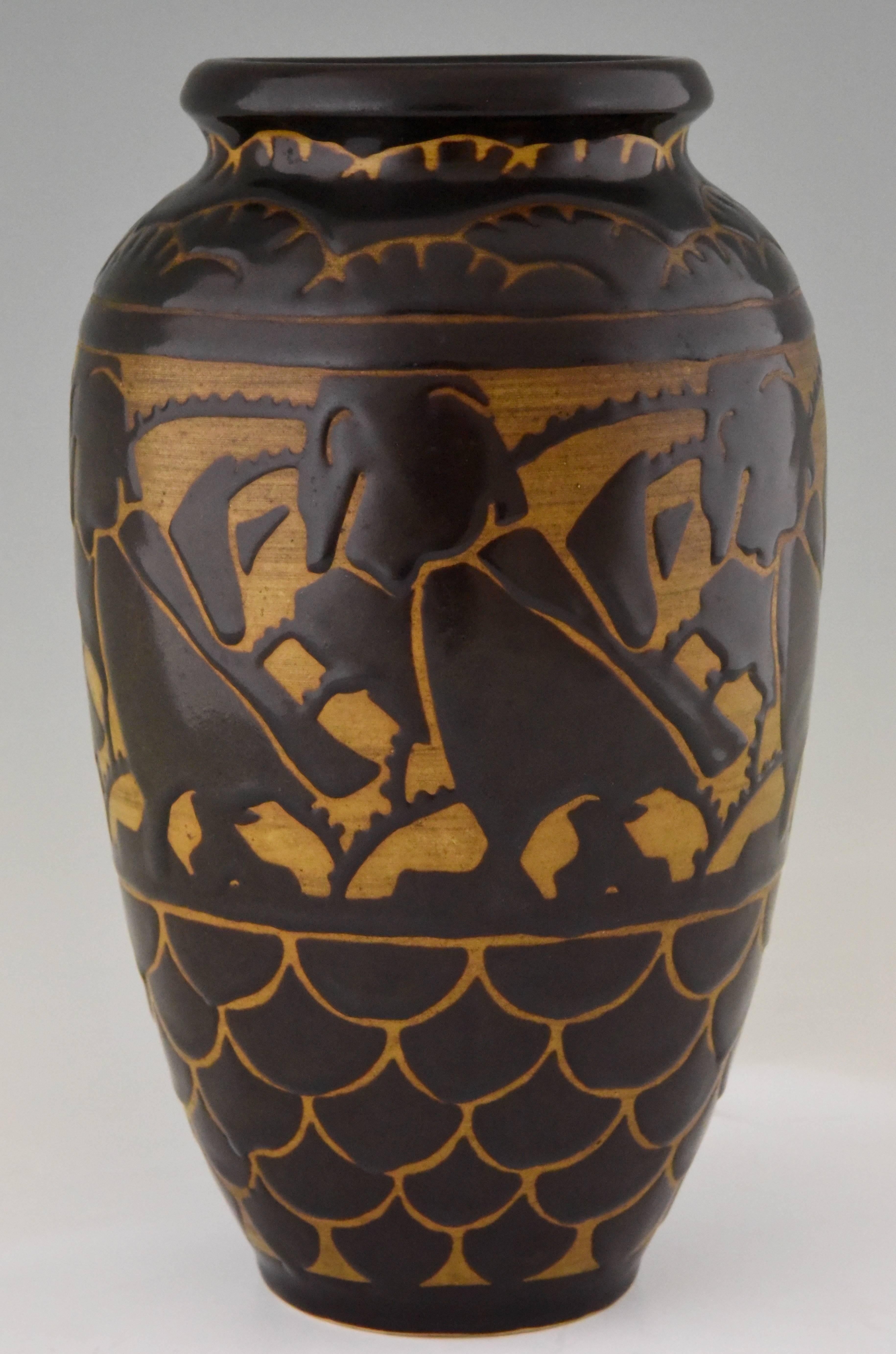 Very nice Art Deco vase by the famous designer Charles Catteau. We bought a pair of these vases, so they can be bought separately or as a pair.
Artist/ maker: Charles Catteau for Keramis
Signature/ marks: Ch Catteau, D 1026A Keramis stamp. Grès