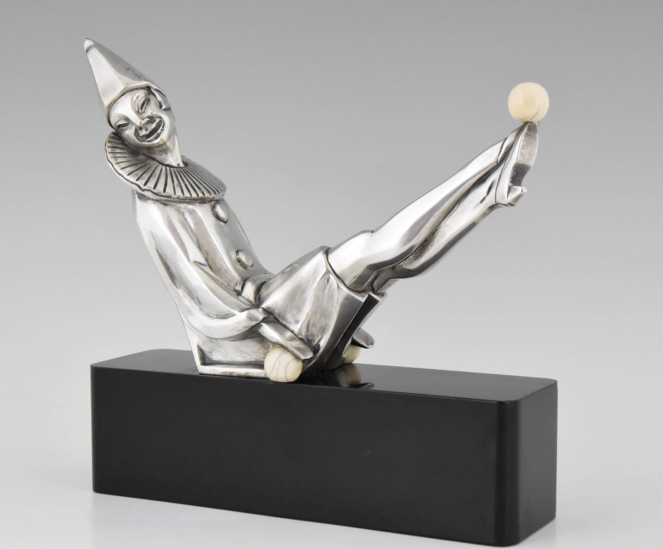 Art Deco bronze sculpture of Pierette or femaie clown by Marcel Andre Bouraine. (1886-1948)
Signature: Bouraine.
Foundry mark: LN seal. Les neveux de Lehmann, Paris. 

This model is illustrated op page 57 of “Art deco and other figures” by Brian