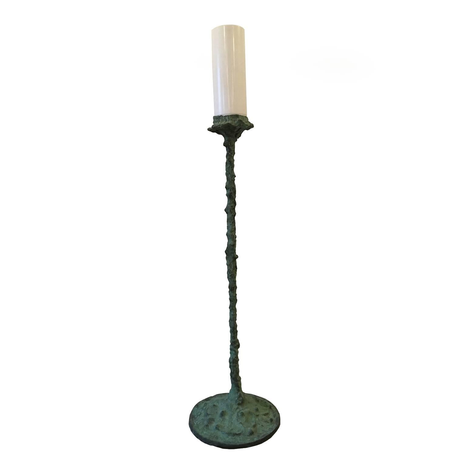 Bronze sculpture by Saint Clair Cemin.

Bronze stem with patina, opaline perspex light diffuser, lampshade.

Part of a limited edition of 12.