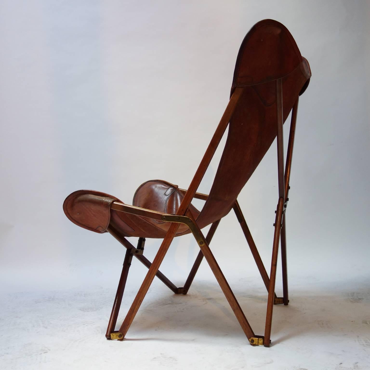 'Tripolina' folding chair designed by Joseph Beverly Fenby.

The Tripolina chair was made from prior to WWII by the firm of Viganò in Tripoli, Libya, for the expatriate Italian market as a camping chair of great stability in the sand and made