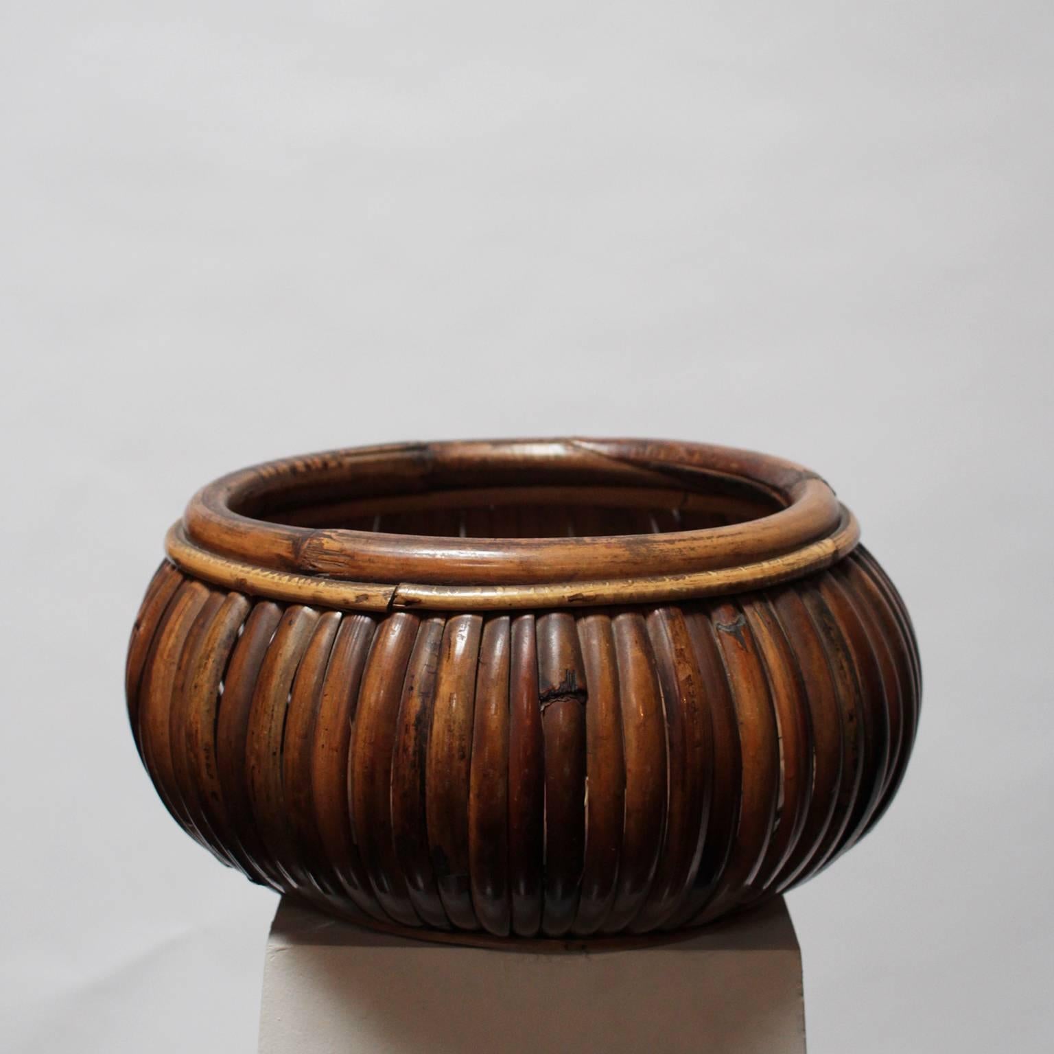 Large bowl in curved bamboo by Gabriella Crespi.

Part of the 