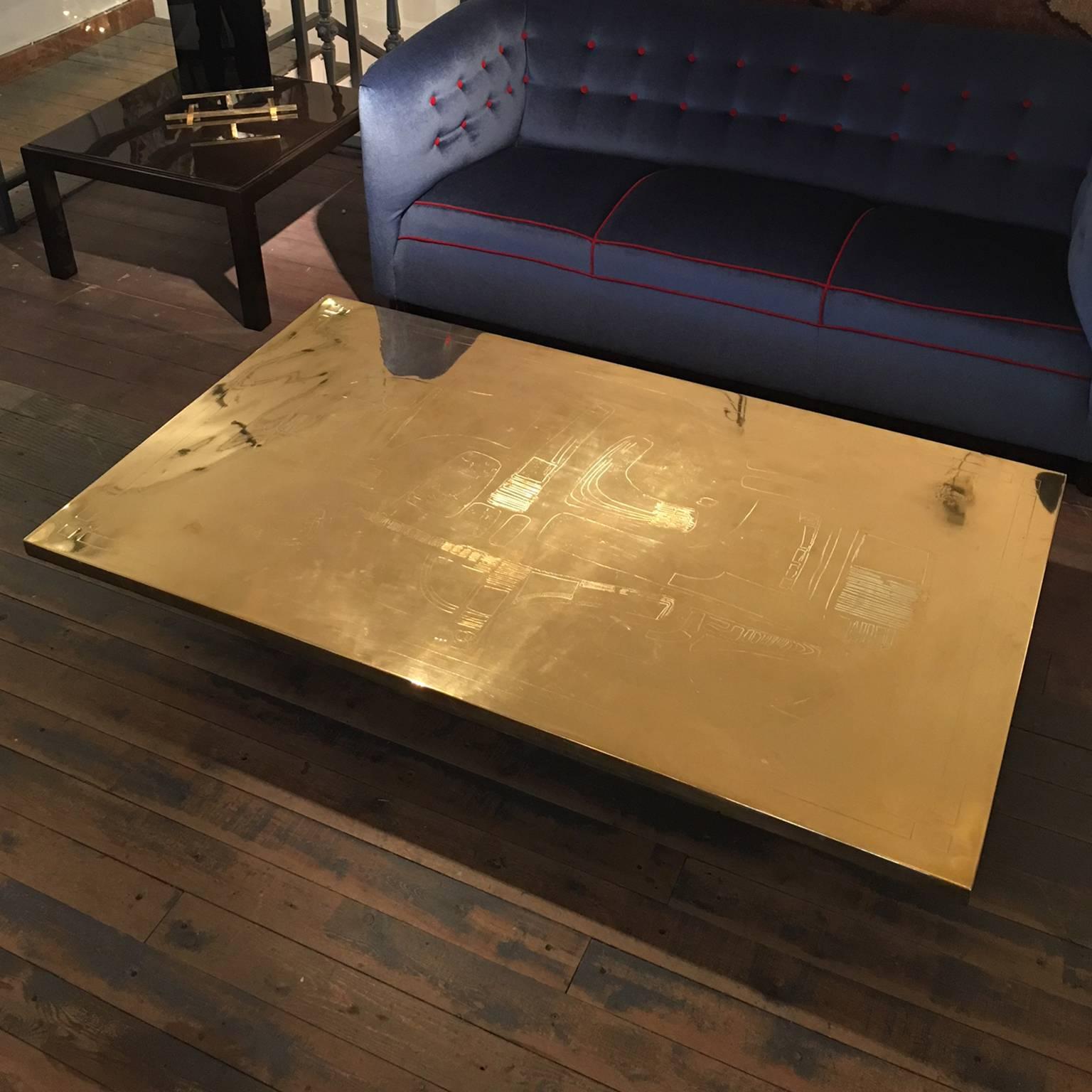 Etched brass coffee table by Paco Rabanne.
 