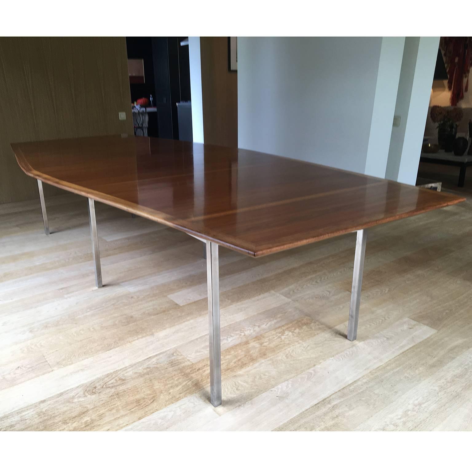 Walnut top boat shaped table on square tube polished chrome legs. Made by Knoll International.