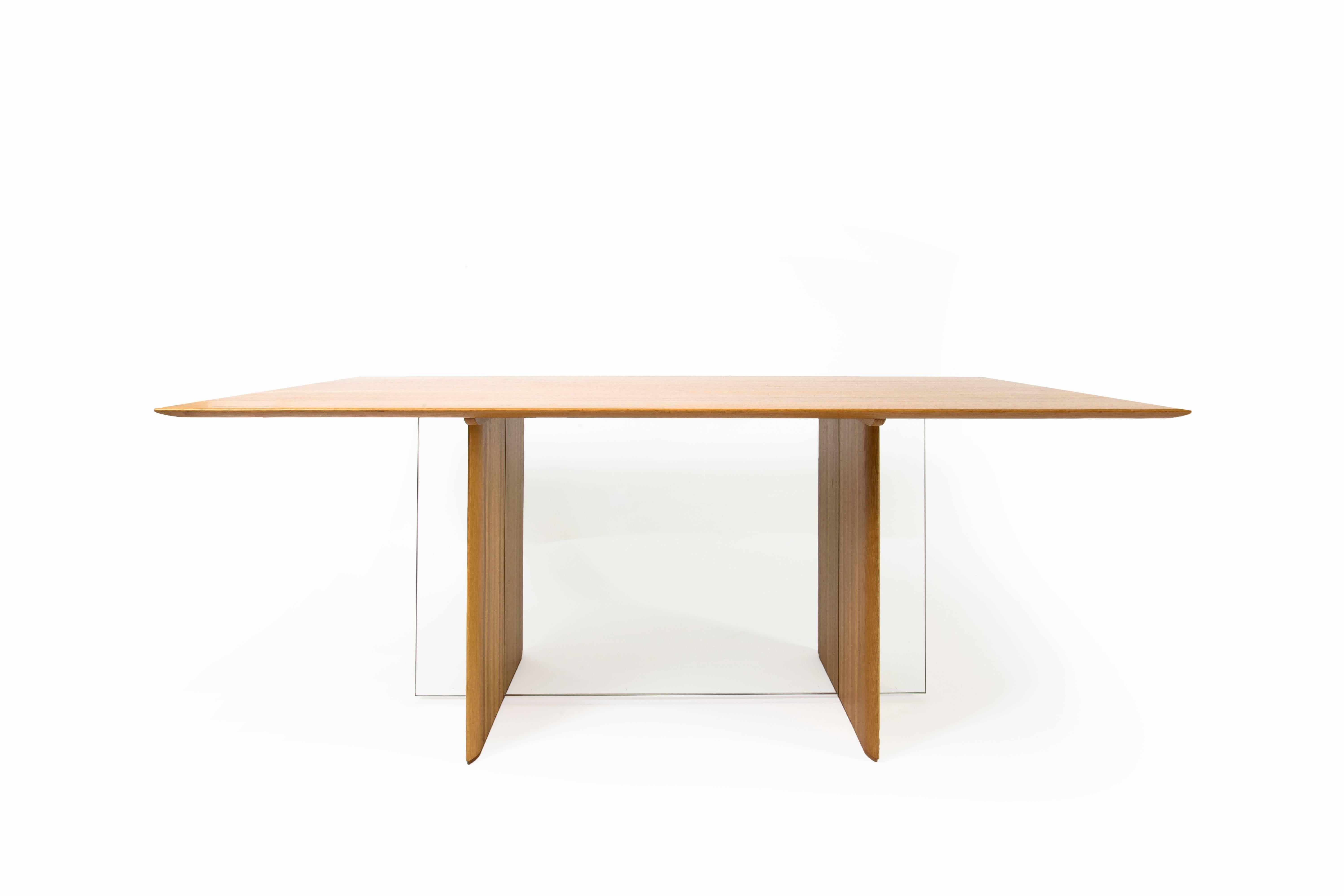 Elegant "Iris" table (or desk) executed by the Van den Berghe Pauvers studio in Belgium. Solid oak and clear glass.