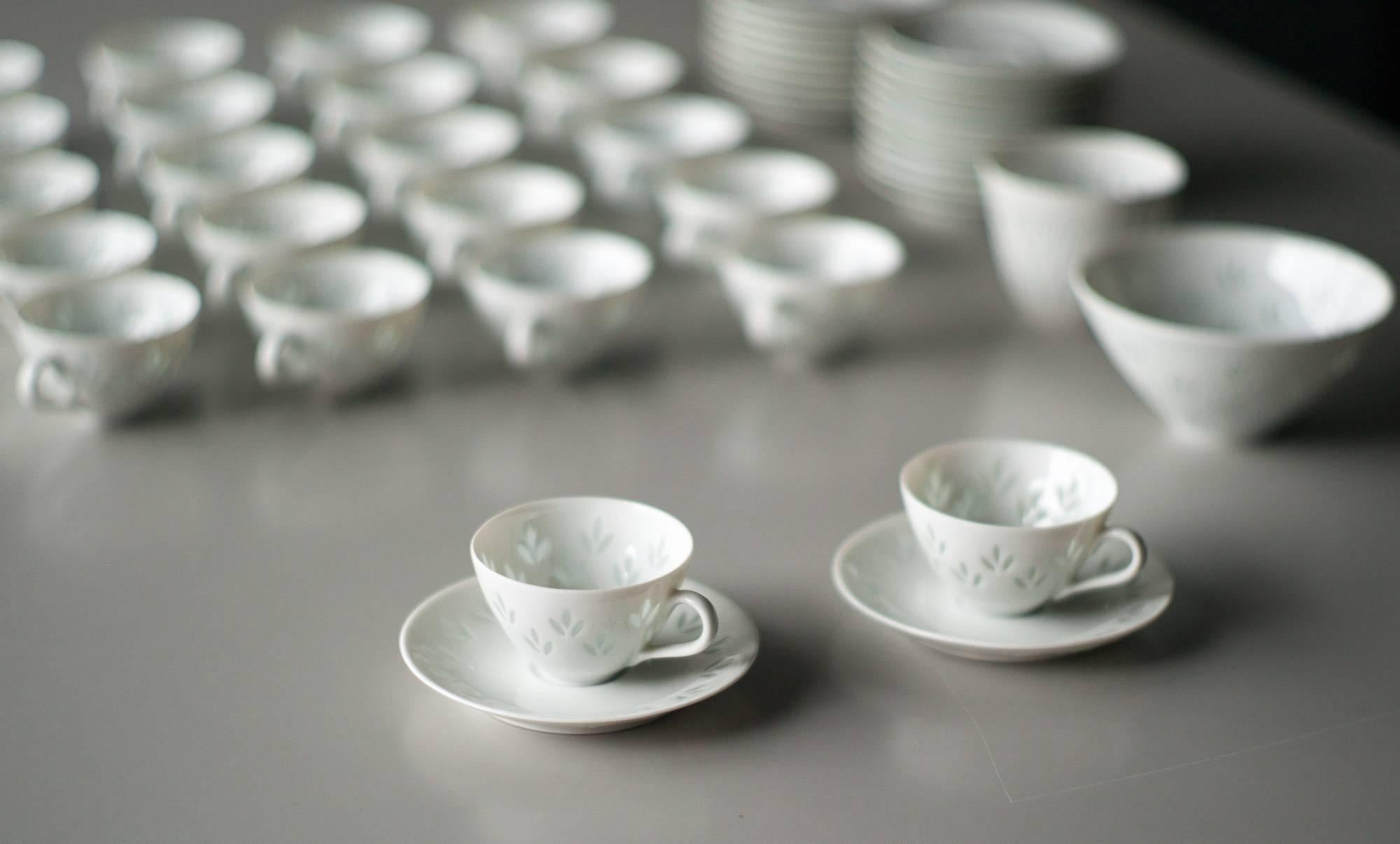 Delicate porcelain tea service with translucent, hand-cut rice motif, in the 