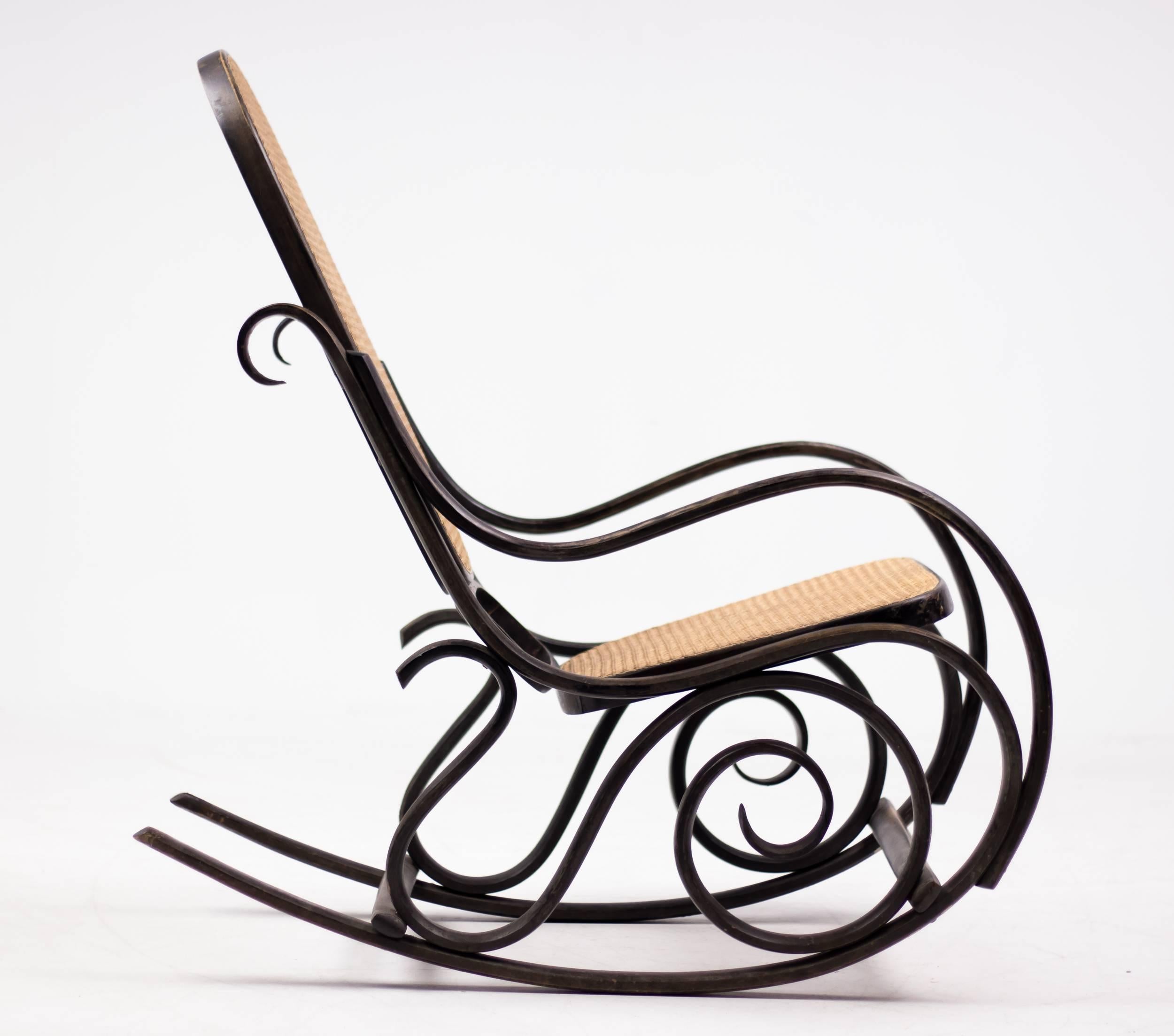 Antique Thonet model #10 bentwood rocking chair. The maker of this early 20th century rocker was Salvatore Leone from Modena, Northern Italy. The Leone's where, besides furniture making, also into coach building, cabinetmaking and boat building.