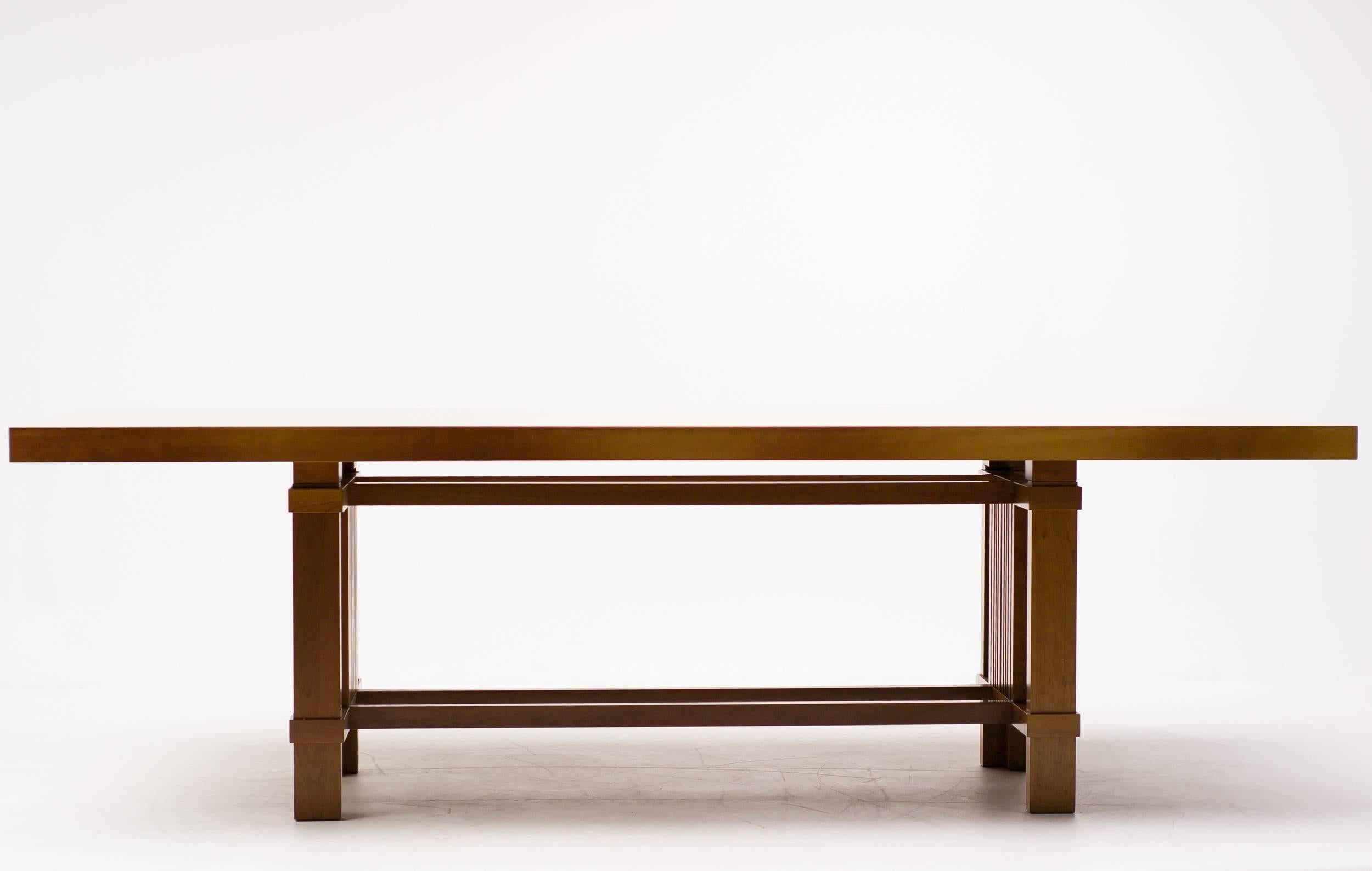 Distinguished large dining table, in natural cherry. Vintage 1989 version in very good condition. The table has only has a few very minor scuffs and one small wear spot as pictured. Marked with Cassina stamp, serial no. and Frank Lloyd Wright
