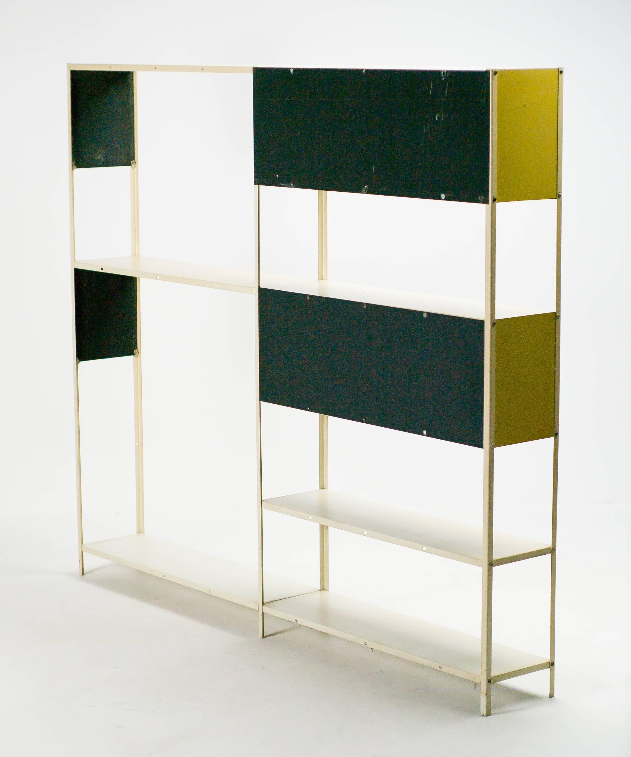 Room divider or bookcase designed by Friso Kramer in 1953 for the Dutch warehouse 