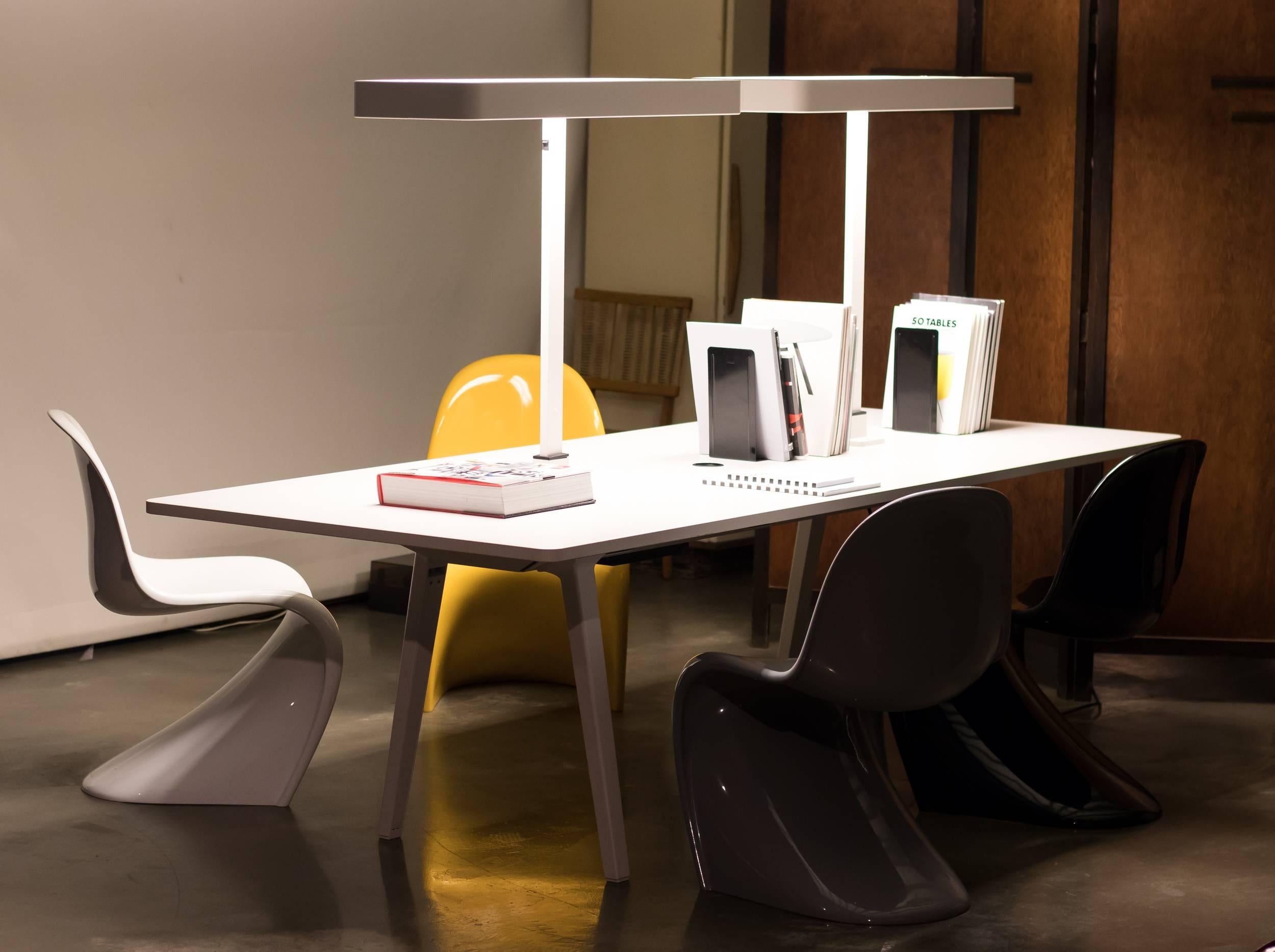 Vitra Joyn four person workstation designed by Ronan & Erwan Bouroullec, 2002
The price is for the entire unit in the image without the chairs and books.
This includes the two table mounted lights and a complete (under table) cable management