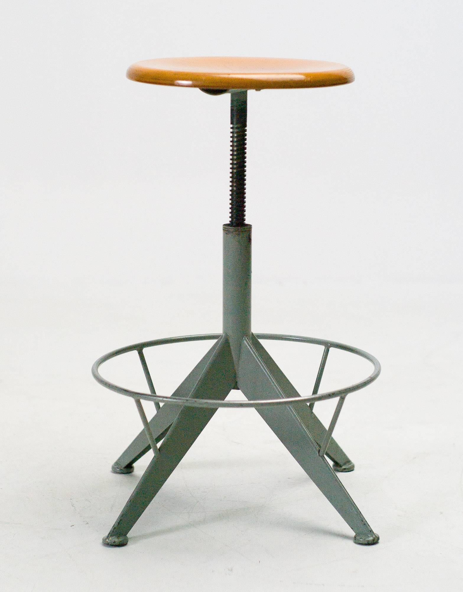 Great Industrial work stool, the design often attributed to Jean Prouvé.
Very practical piece, height adjustable with a spindle from 36 cm to 56 cm.
 