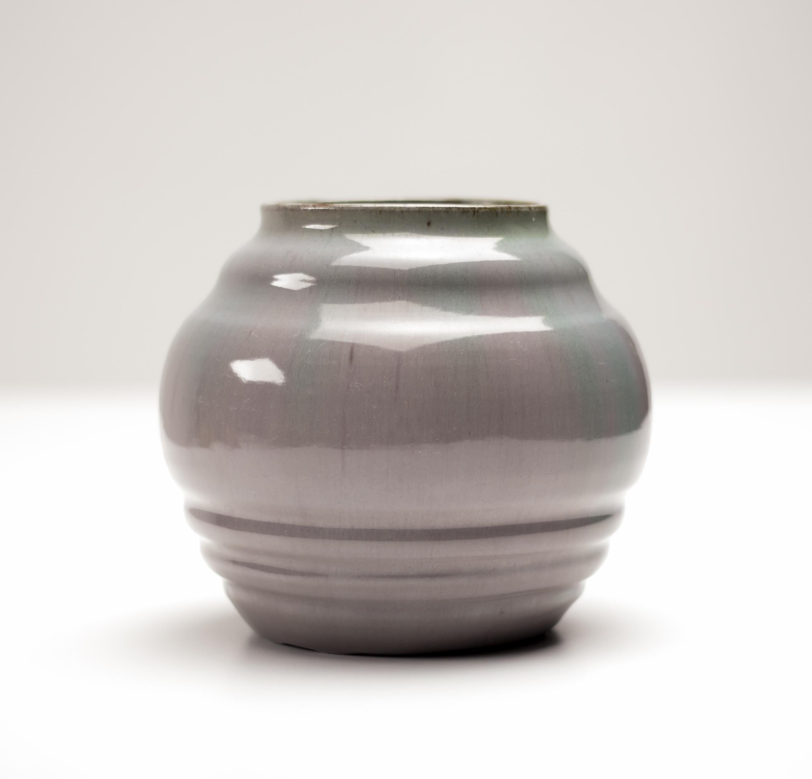 A striking and rare ceramic vase by renowned Dutch sculptor and ceramist W.C. Brouwer, crafted in his own workshop in the Netherlands. This piece exemplifies Brouwer’s signature fusion of sculptural form and refined glaze work, reflecting the Art