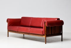 Divano di Johannes Andersen in palissandro brasiliano con rivestimento in pelle bordeaux, Danimarca, anni ’60
