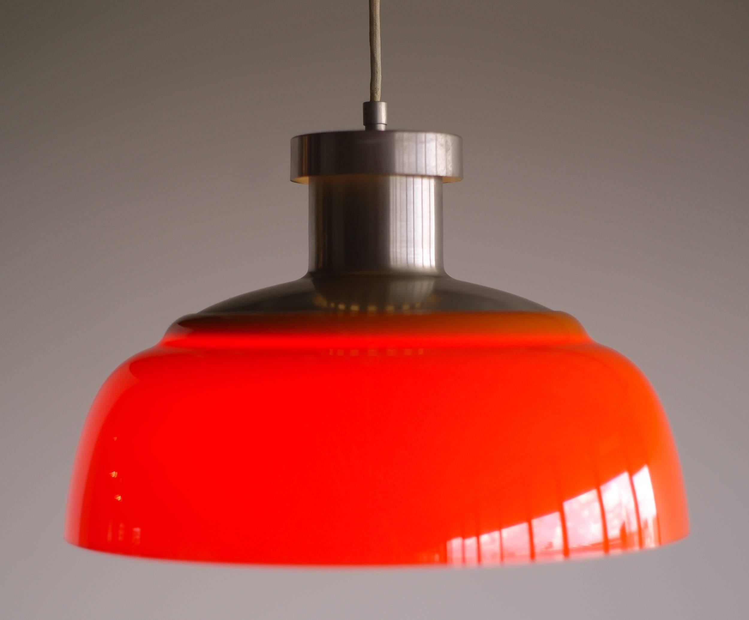 Rare pendant, this was the first lighting design by Achille Castiglioni.
Made of nickel-plated steel with an acrylic shade it looks very contemporary, but it is vintage Mid-Century Modern!

Excellent fast and affordable worldwide shipping.
