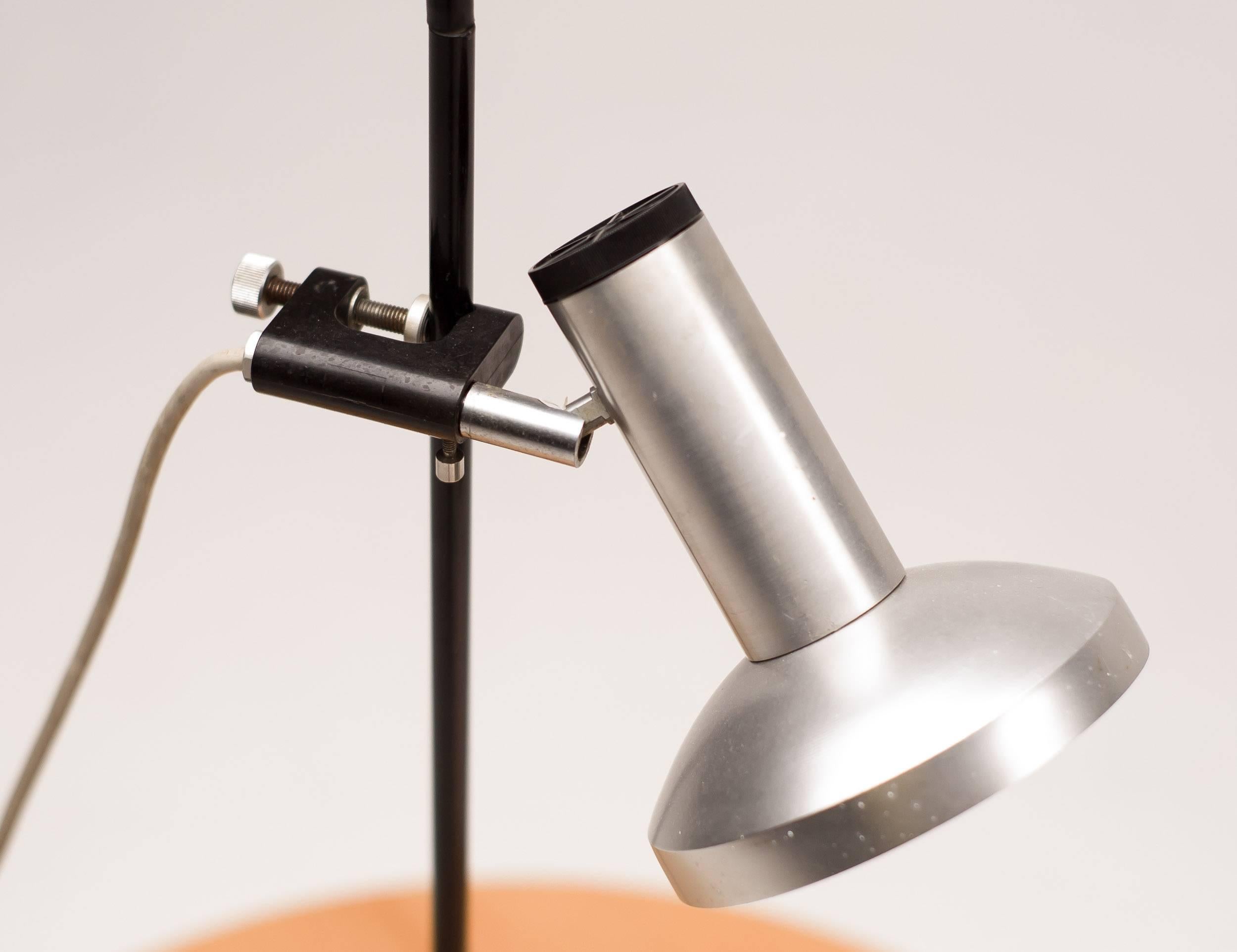 Nice table lamp with aluminium shade, adjustable with a clamp.
Functional industrial design.

Excellent fast and affordable worldwide shipping.