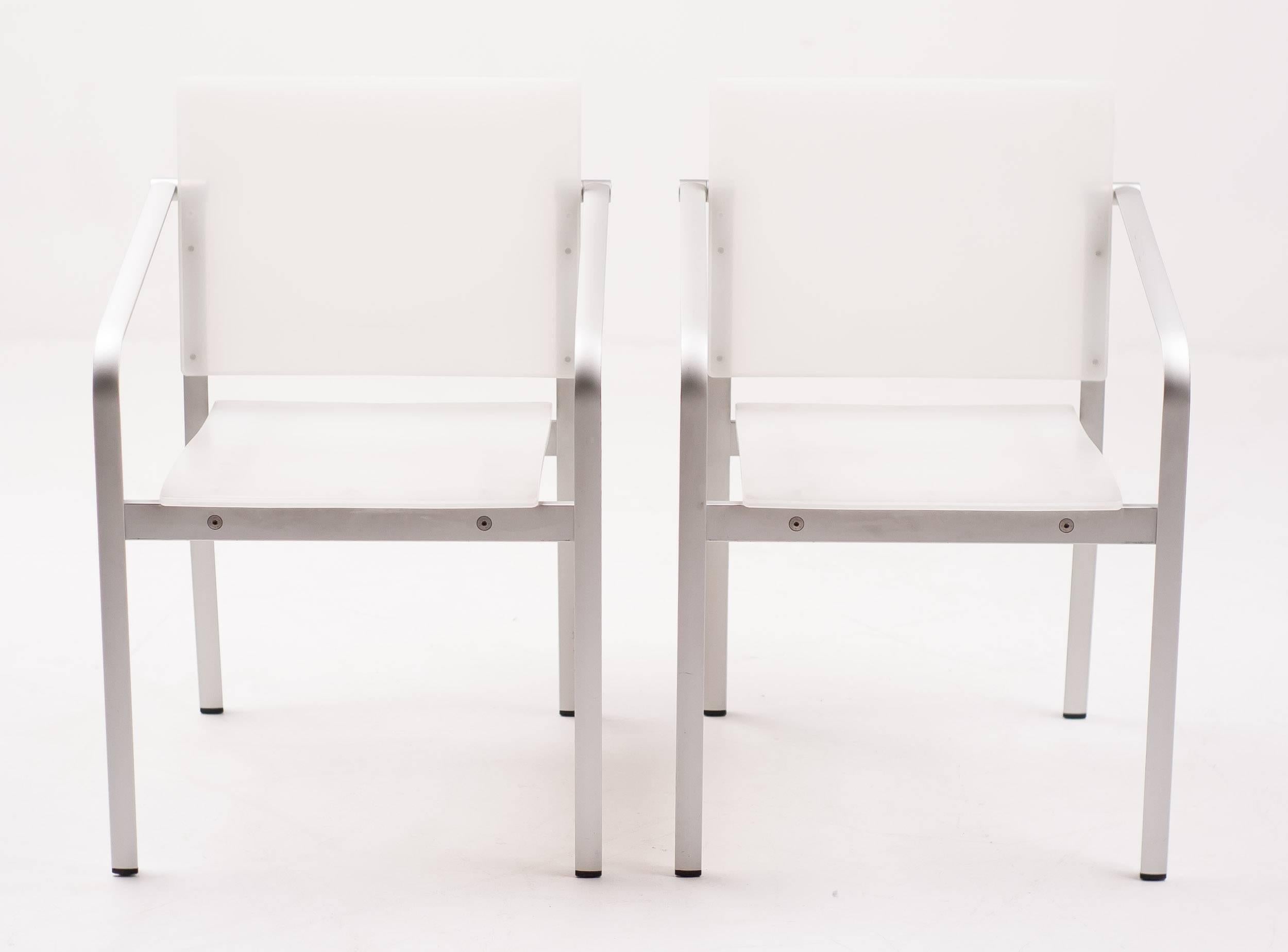 Pair of chairs designed by Sir Norman Foster & Partners for Thonet in 1997, model A900F. This version has an aluminium frame and seat and backrest in translucent white plastic. The chairs are stackable and suitable for in- and outdoor