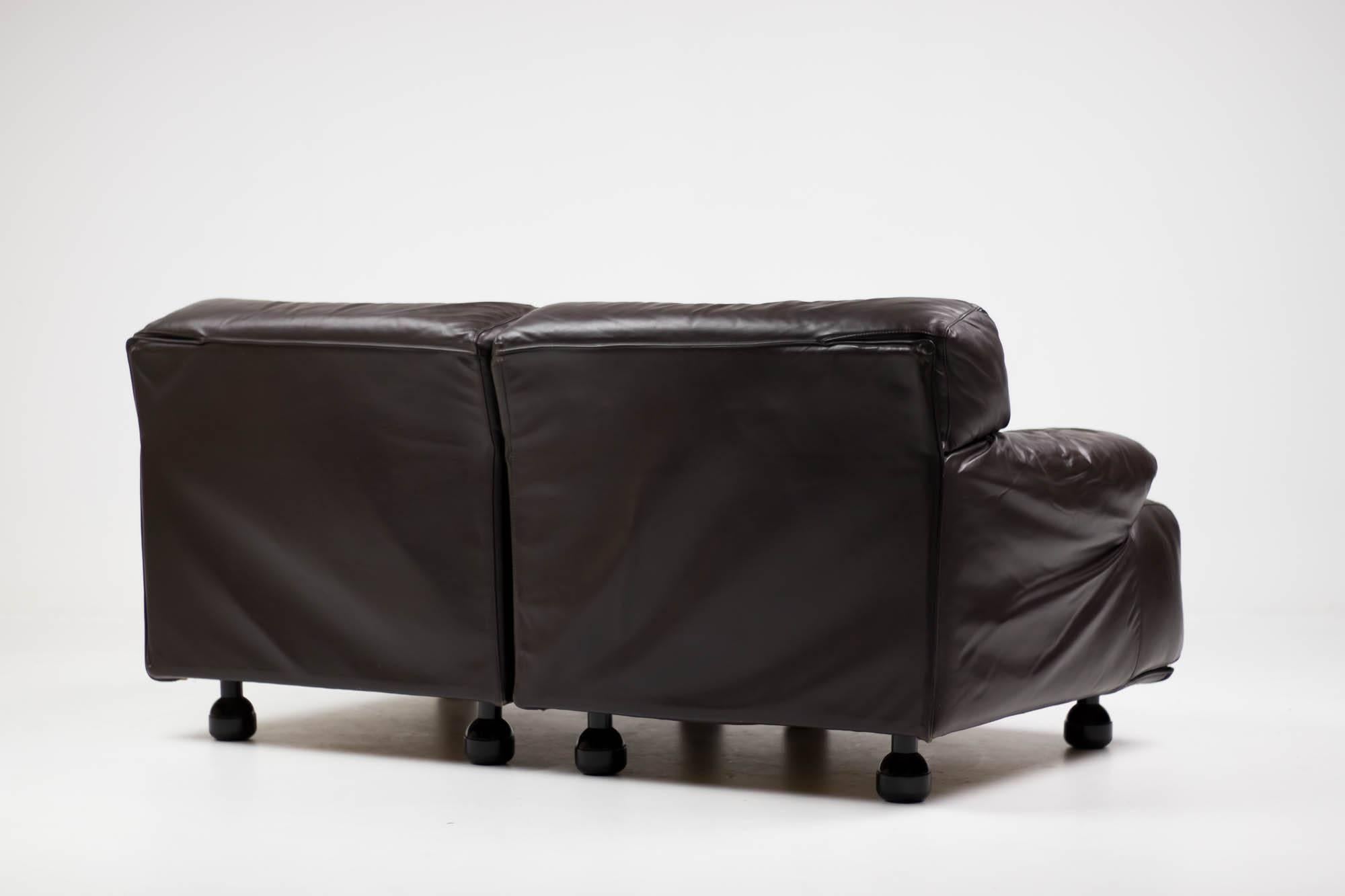 Fiandra sectional sofa designed by Vico Magistretti in 1975 and produced by Cassina, Italy. 
Upholstered in the original Cassina very dark brown leather. Marked with Cassina label.


 