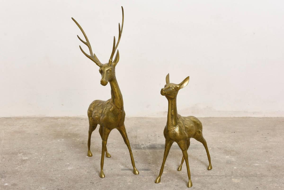Large Hollywood Regency mantel size solid brass set of two deers, buck and doe with intricate details. 

Beautiful patina.