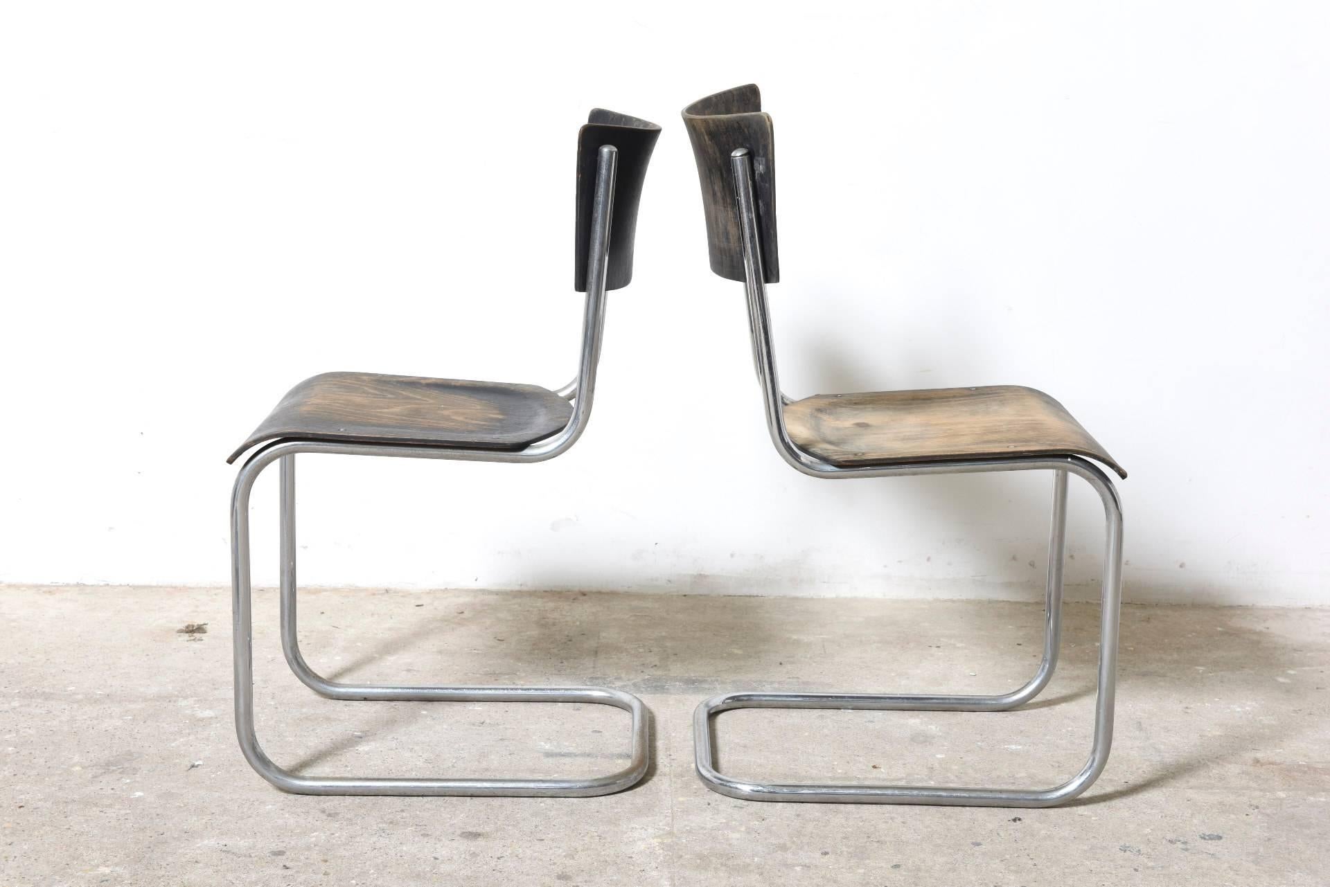 These chairs model S43 was designed by Mart Stam and manufactured by Thonet. 
Made from chromed tubular steel the seat and backrest from beechwood. 

The chairs remains in an excellent vintage original condition, some minor scratches and paint loss