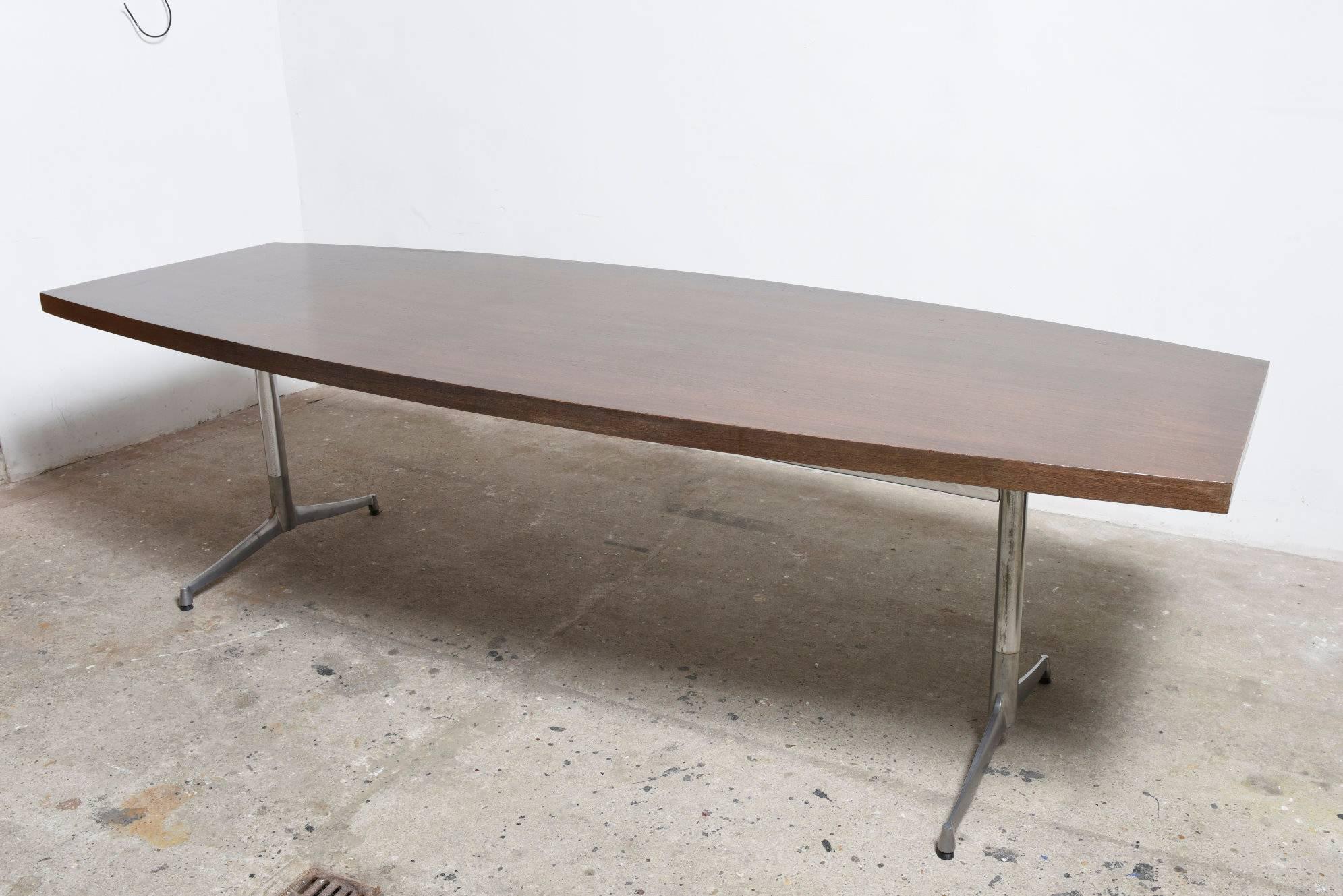 Large Wengé boat shape dining or conference table on chrome base.