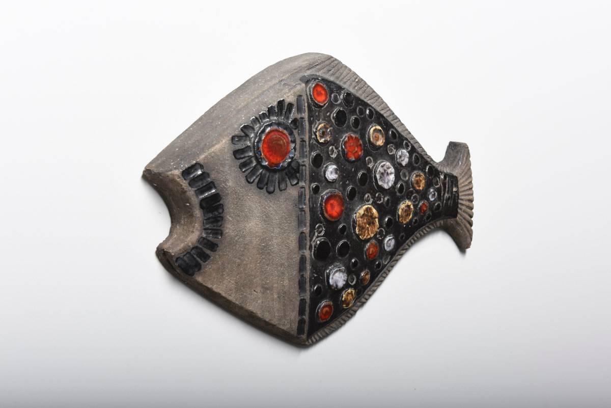 Decorative 1960s wall ceramic fish plaquette in strong yet subtle colors. Unsigned.