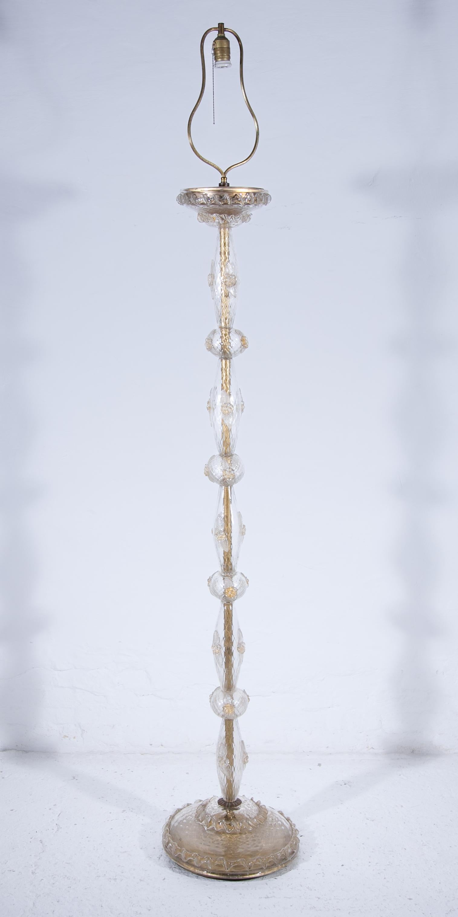 Murano Glass Floor lamp featured with crystal cut glass structures and gold inlay, decorated with flower glass accents mouth blown and hand formed. The electricity has been renewed to US standard. The lamp is in original good condition, there is no