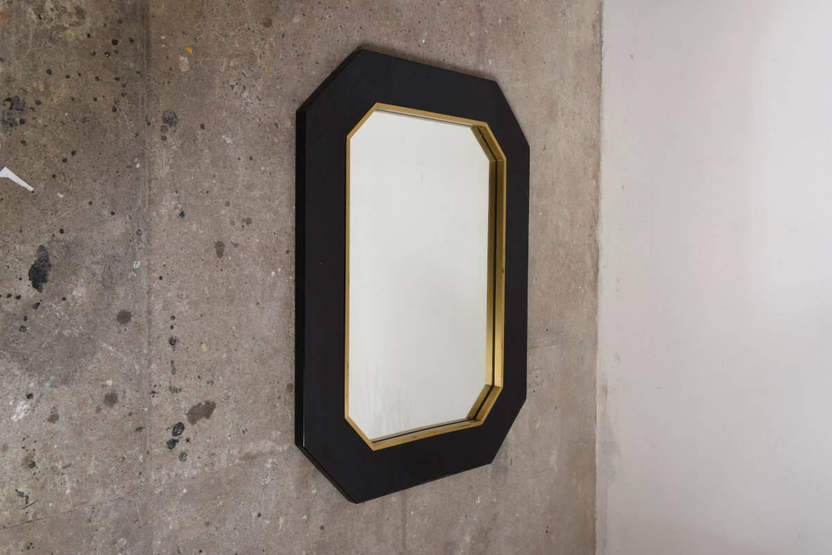 French frame mirror high gloss black lacquer with gold polished brass backing.