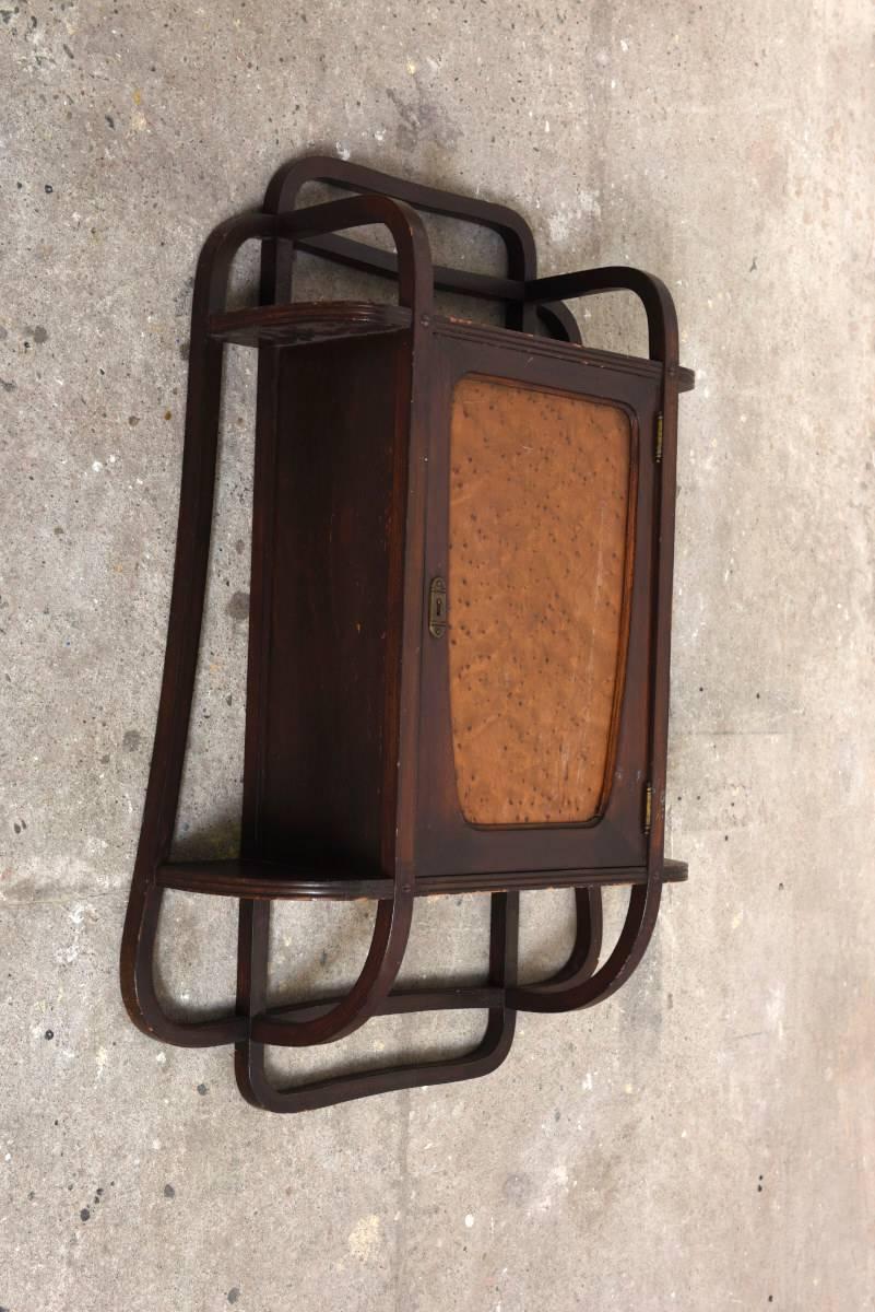 Very beautiful pure Art Nouveau designed wall cabinet in beechwood and in rosewood patinated with burl wood front in Austria designed by Marcel Kammerer for the Gebrüder Thonet Company. 



Lit.Gebruder Thonet,Thonet bentwood and other