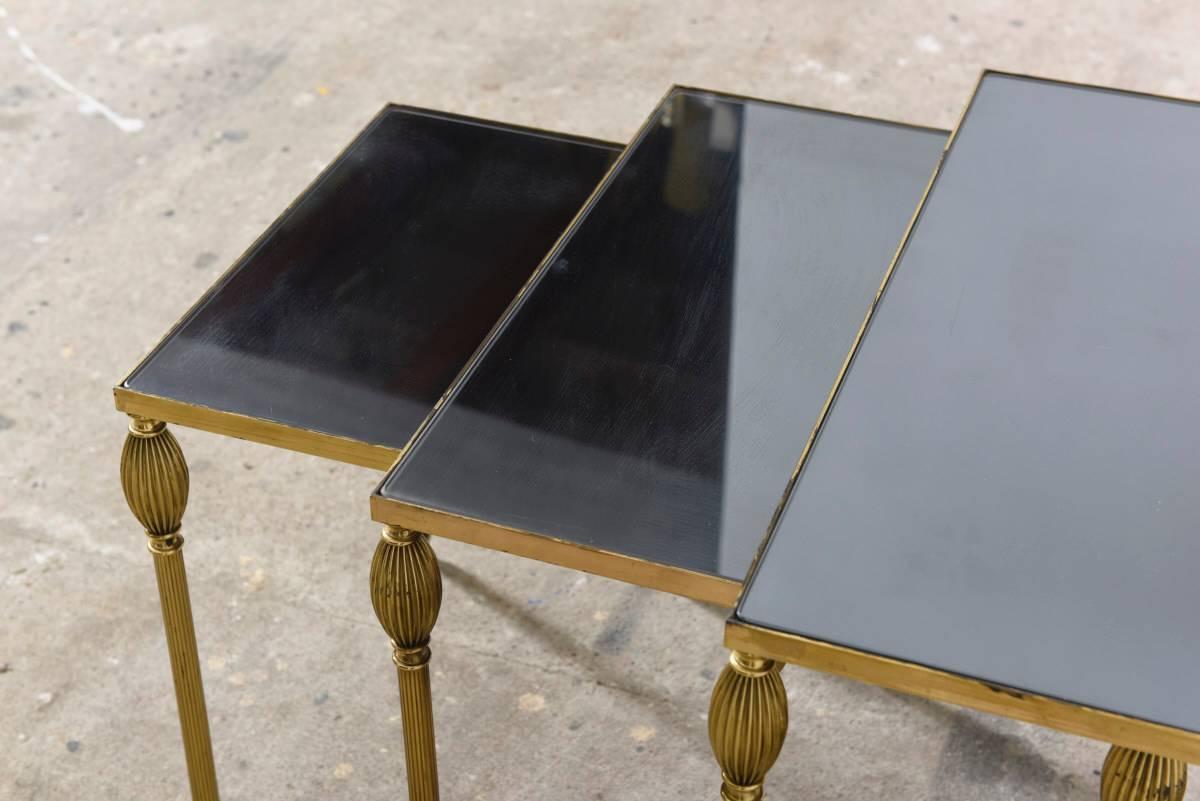 French 1970s Maison Jansen Style Brass and Mirror-Glass Nesting Tables