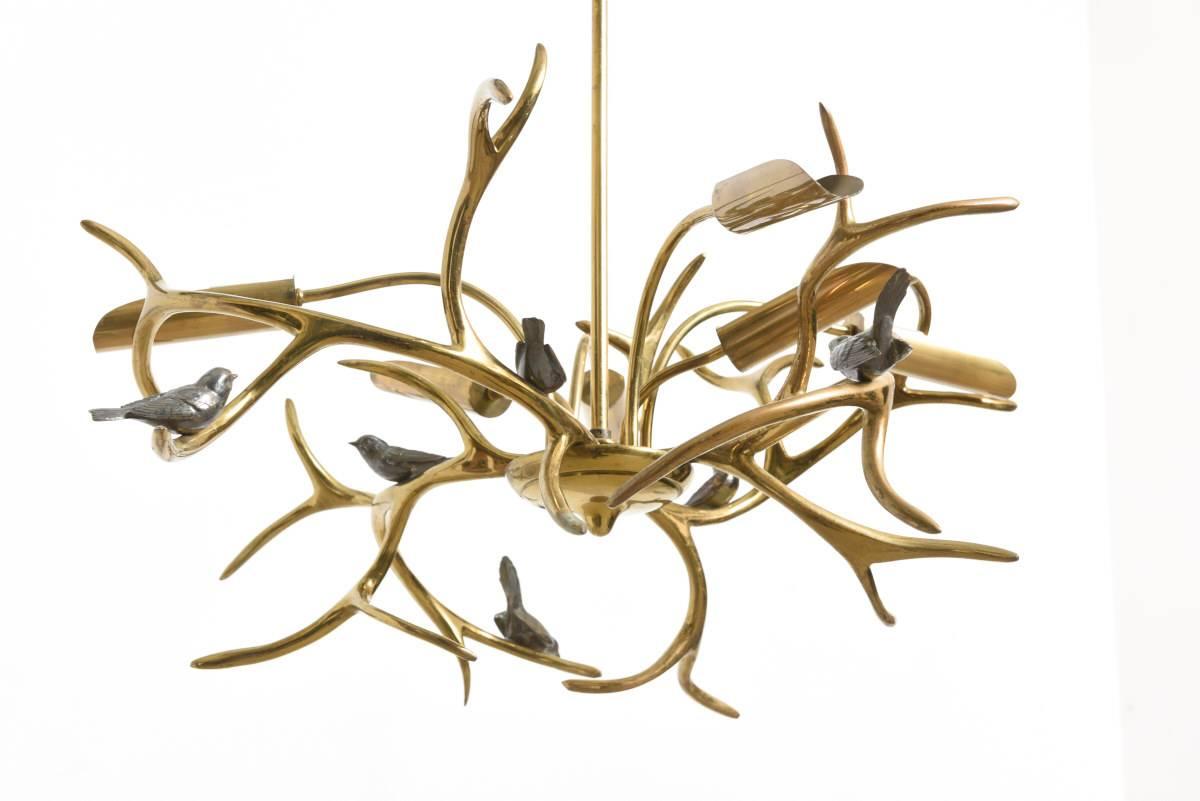 Beautifully Willy Daro six birds chandelier, with six bronze and silver coated birds, perched on branches.

Excellent condition.
The chandelier has been executed with a great attention for detail and material. 

