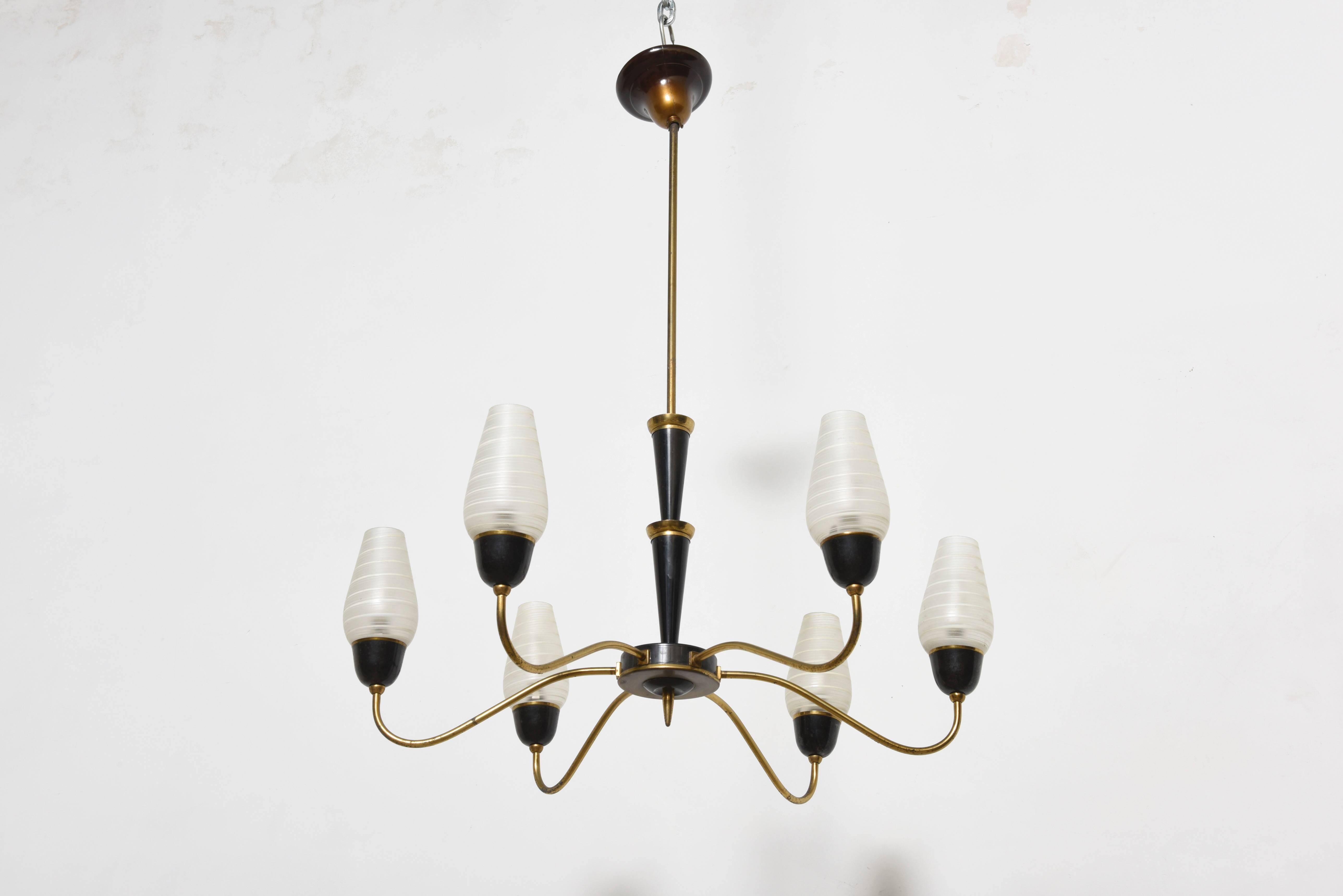 Absolutely stunning six-light chandelier with frosted glass shades and brass tapers designed in 1950 for Arredoluce, Monza.