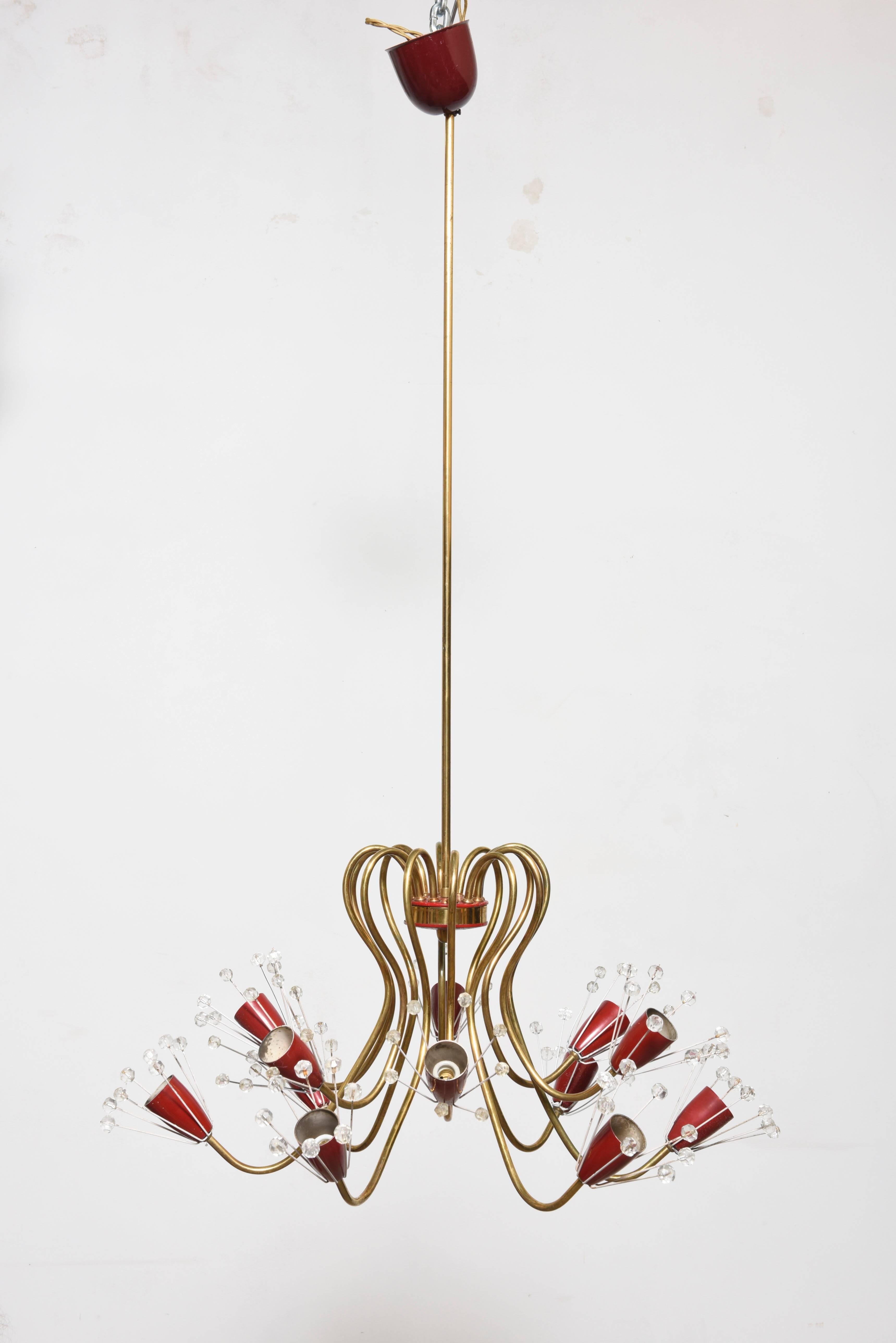 Original early Viennese chandelier by Emil Stejnar for Rupert Nikoll from the 1950s. Made of brass, red lacquered metal and hand cut crystals. Excellent condition. It takes twelve small base bulbs up to 40W each.